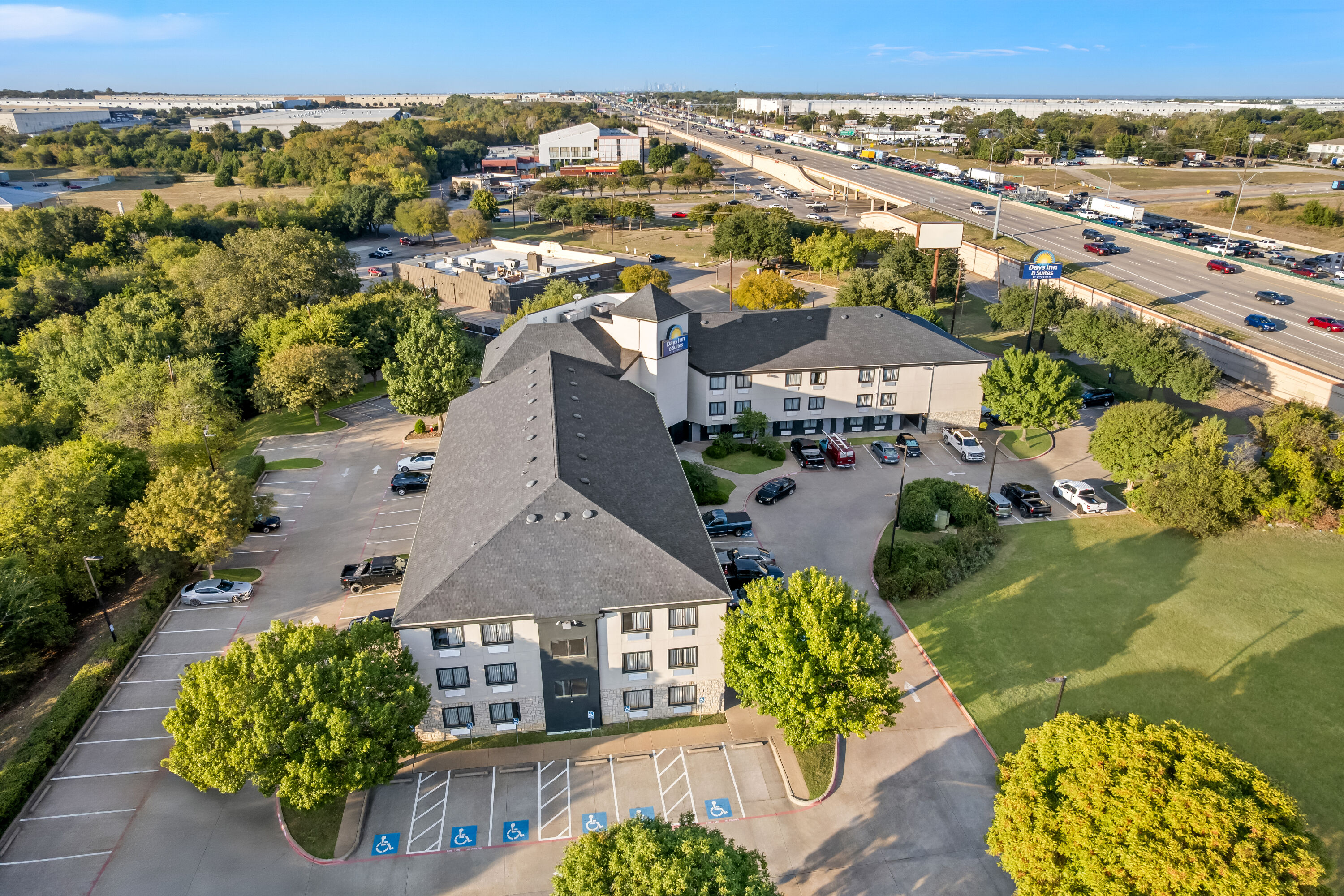 Aerial View of Days Inn & Suites by Wyndham DeSoto hotel in DeSoto, Texas