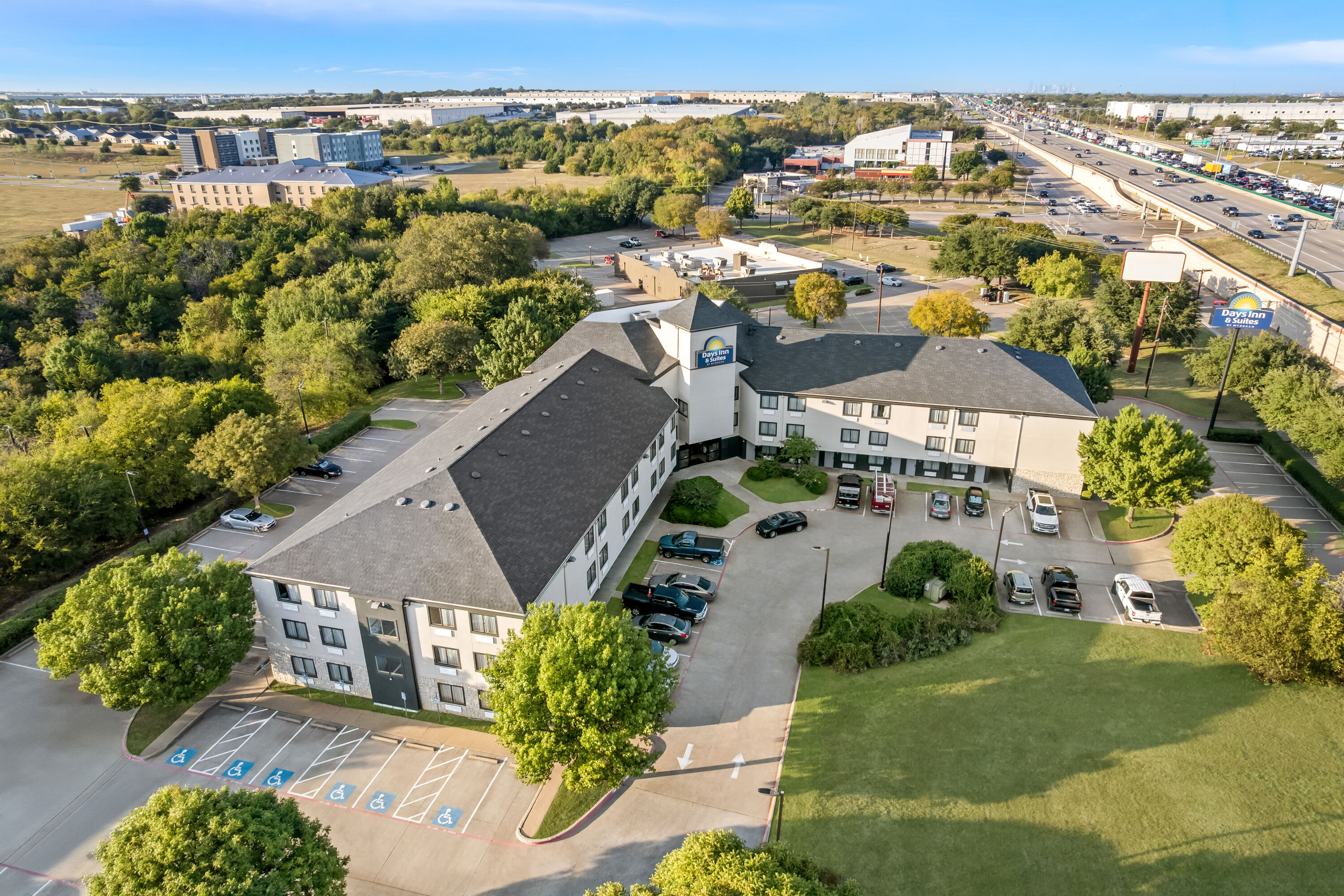 Aerial View of Days Inn & Suites by Wyndham DeSoto hotel in DeSoto, Texas