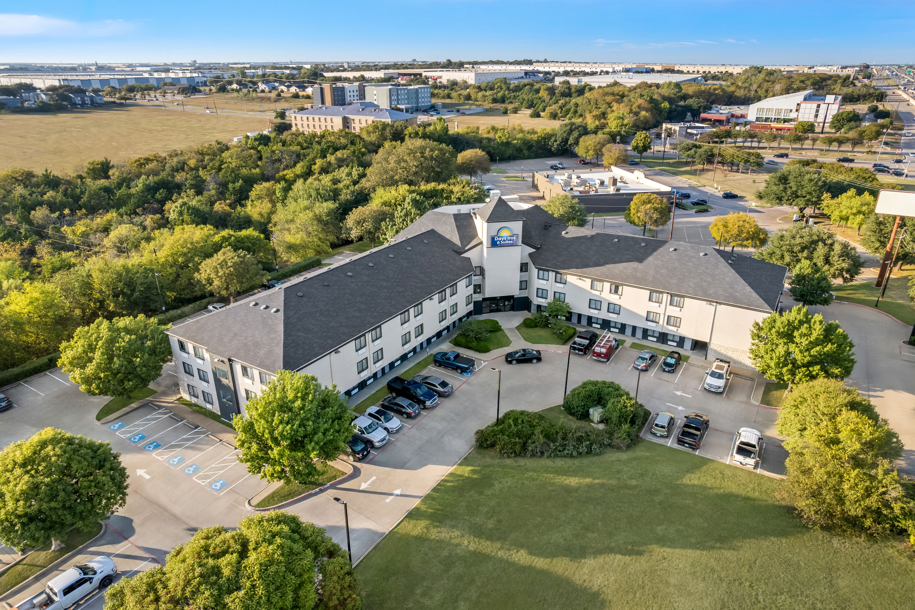 Aerial View of Days Inn & Suites by Wyndham DeSoto hotel in DeSoto, Texas