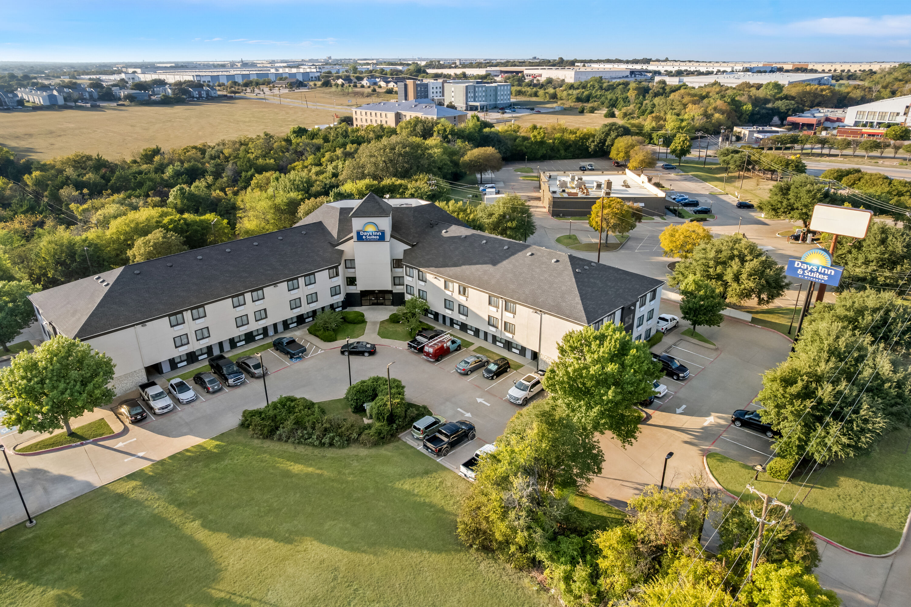 Aerial View of Days Inn & Suites by Wyndham DeSoto hotel in DeSoto, Texas