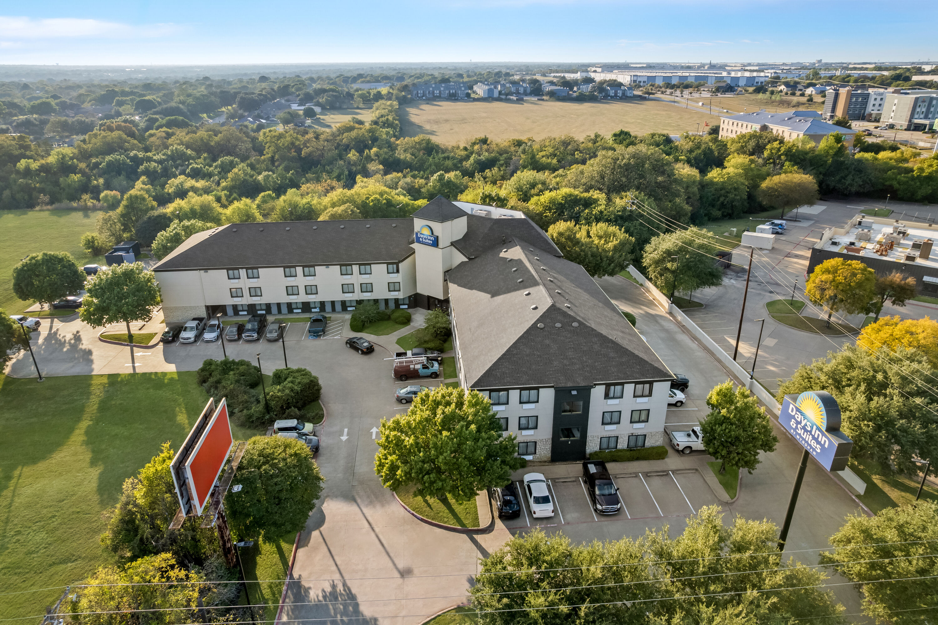 Aerial View of Days Inn & Suites by Wyndham DeSoto hotel in DeSoto, Texas