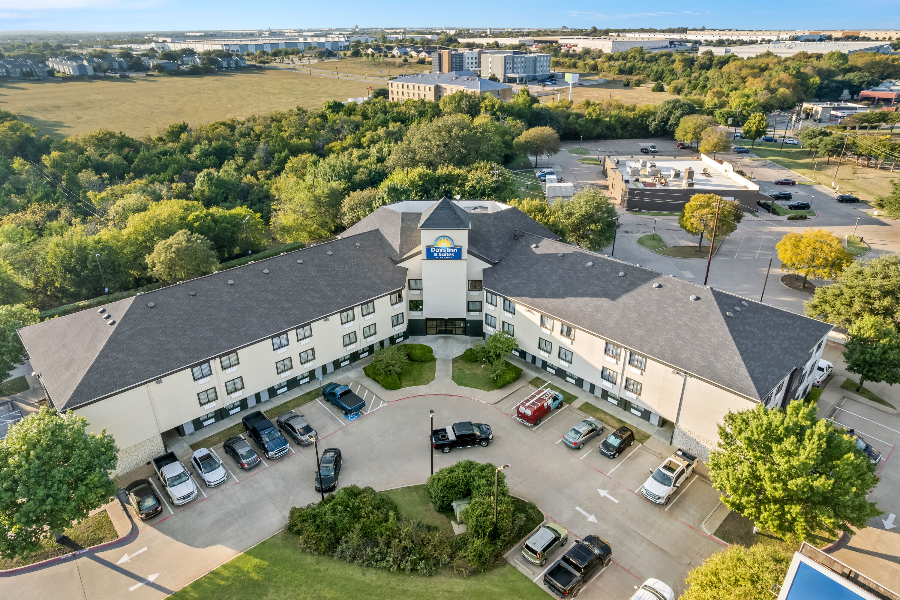 Aerial View of Days Inn & Suites by Wyndham DeSoto hotel in DeSoto, Texas