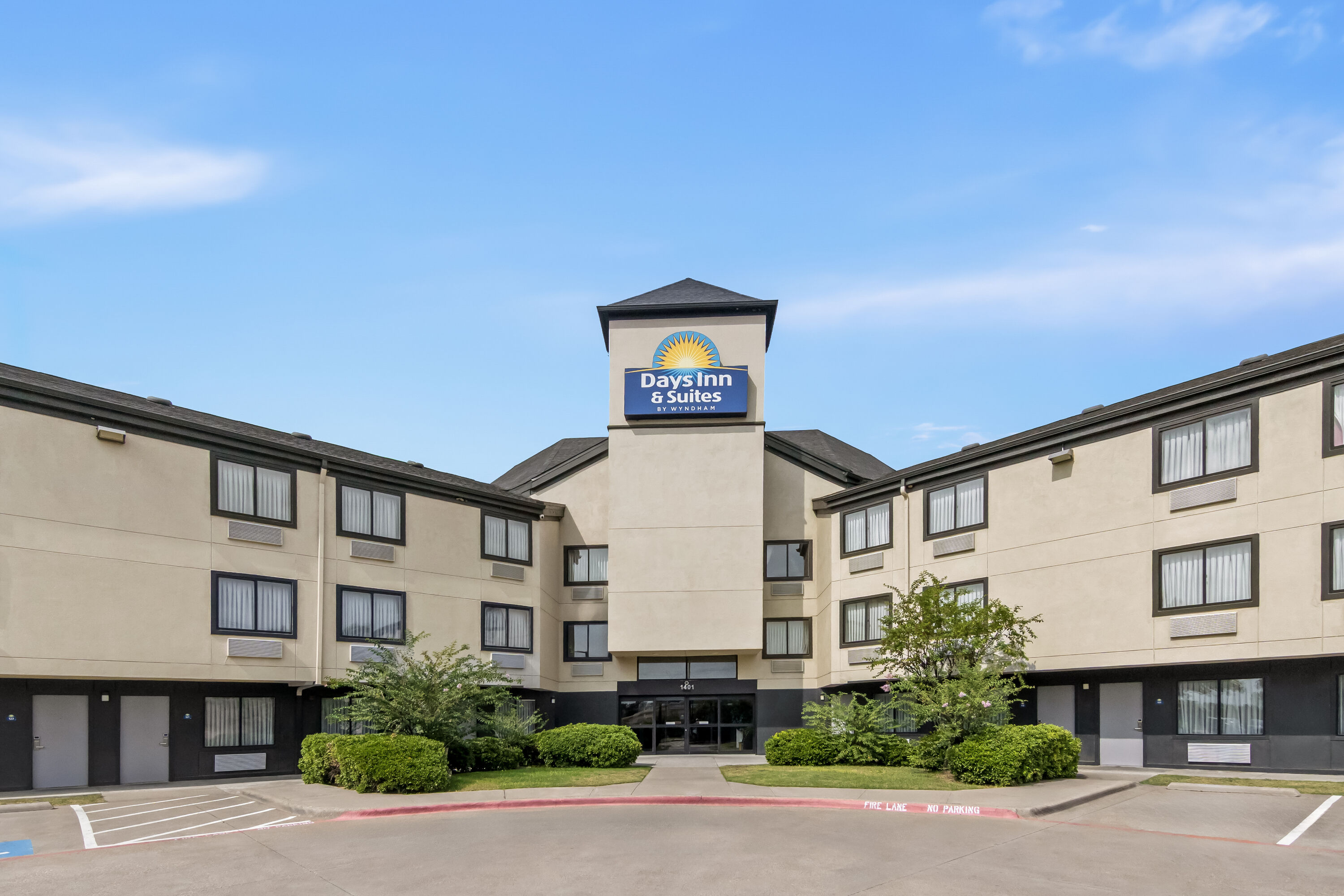 Pool daytime image at the Days Inn & Suites by Wyndham DeSoto in DeSoto, Texas