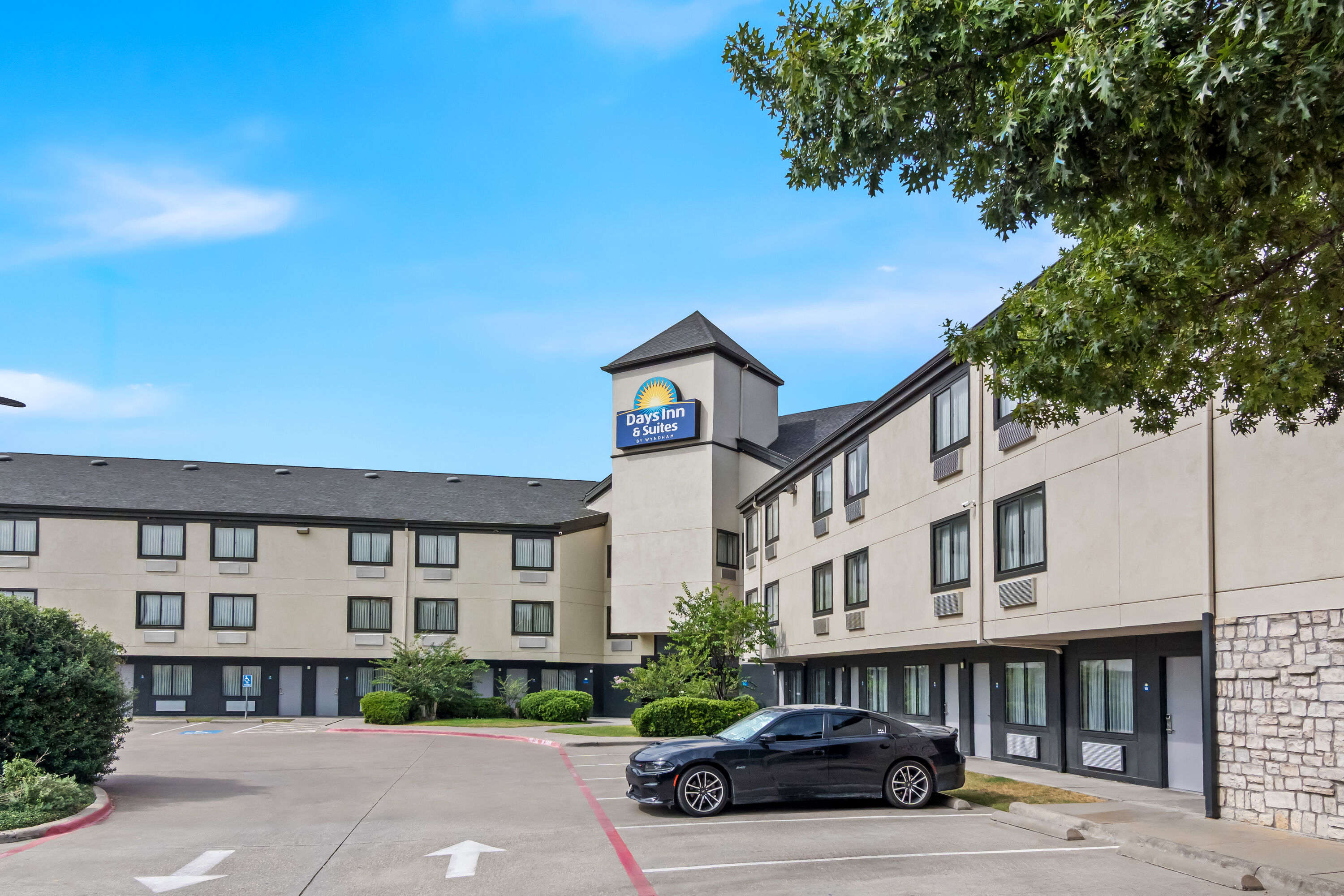 Pool daytime image at the Days Inn & Suites by Wyndham DeSoto in DeSoto, Texas
