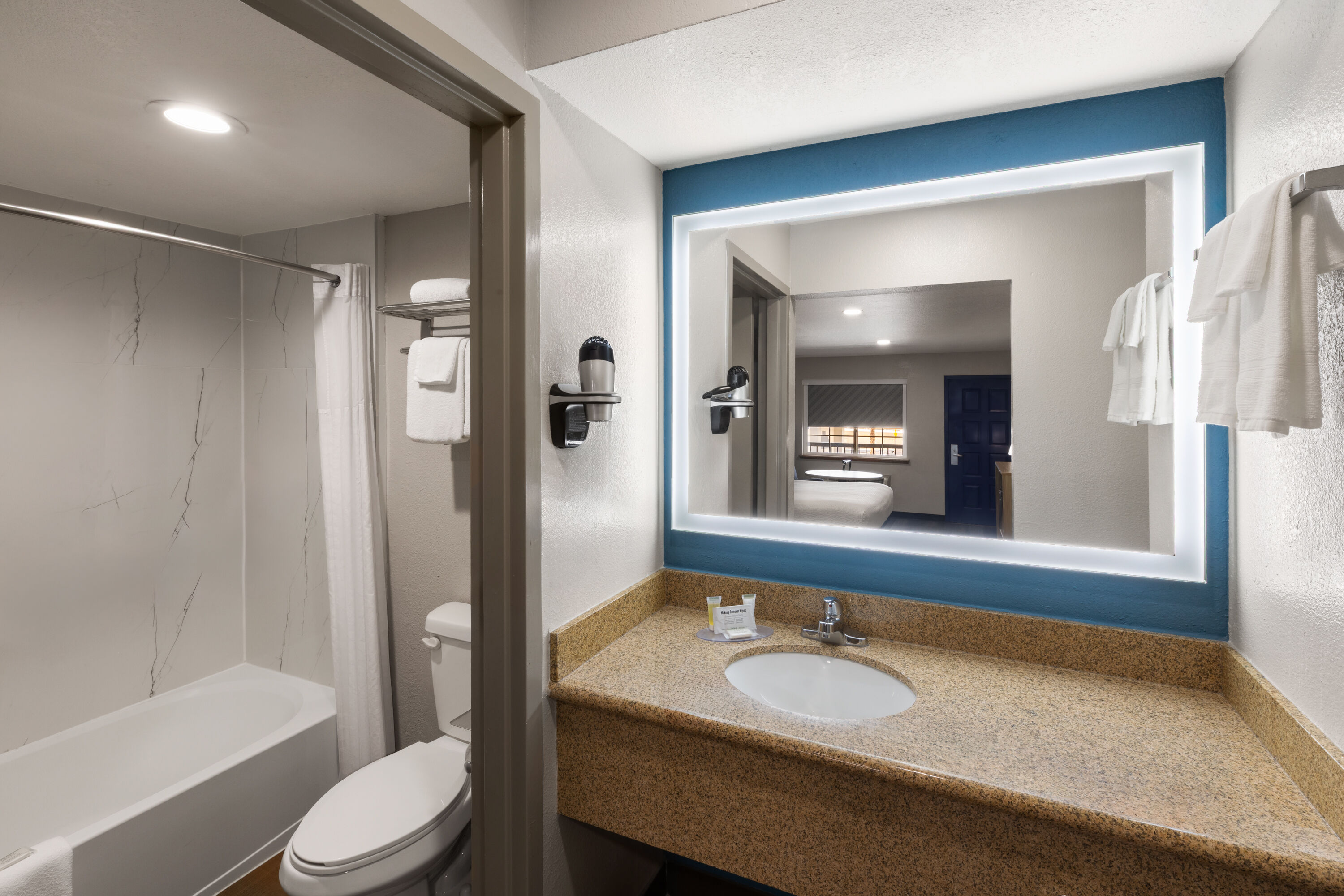Guest room bath at the Days Inn by Wyndham El Paso West in El Paso, Texas