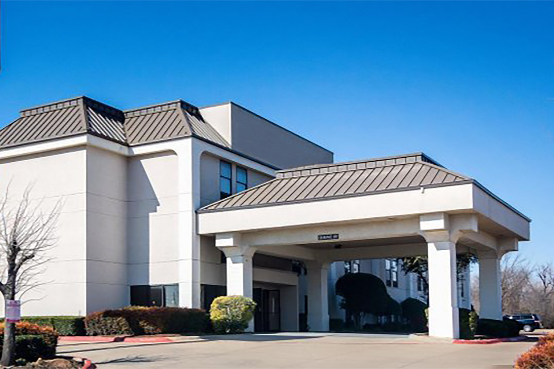 Exterior of Days Inn by Wyndham Fort Worth North / Fossil Creek hotel in Fort Worth, Texas