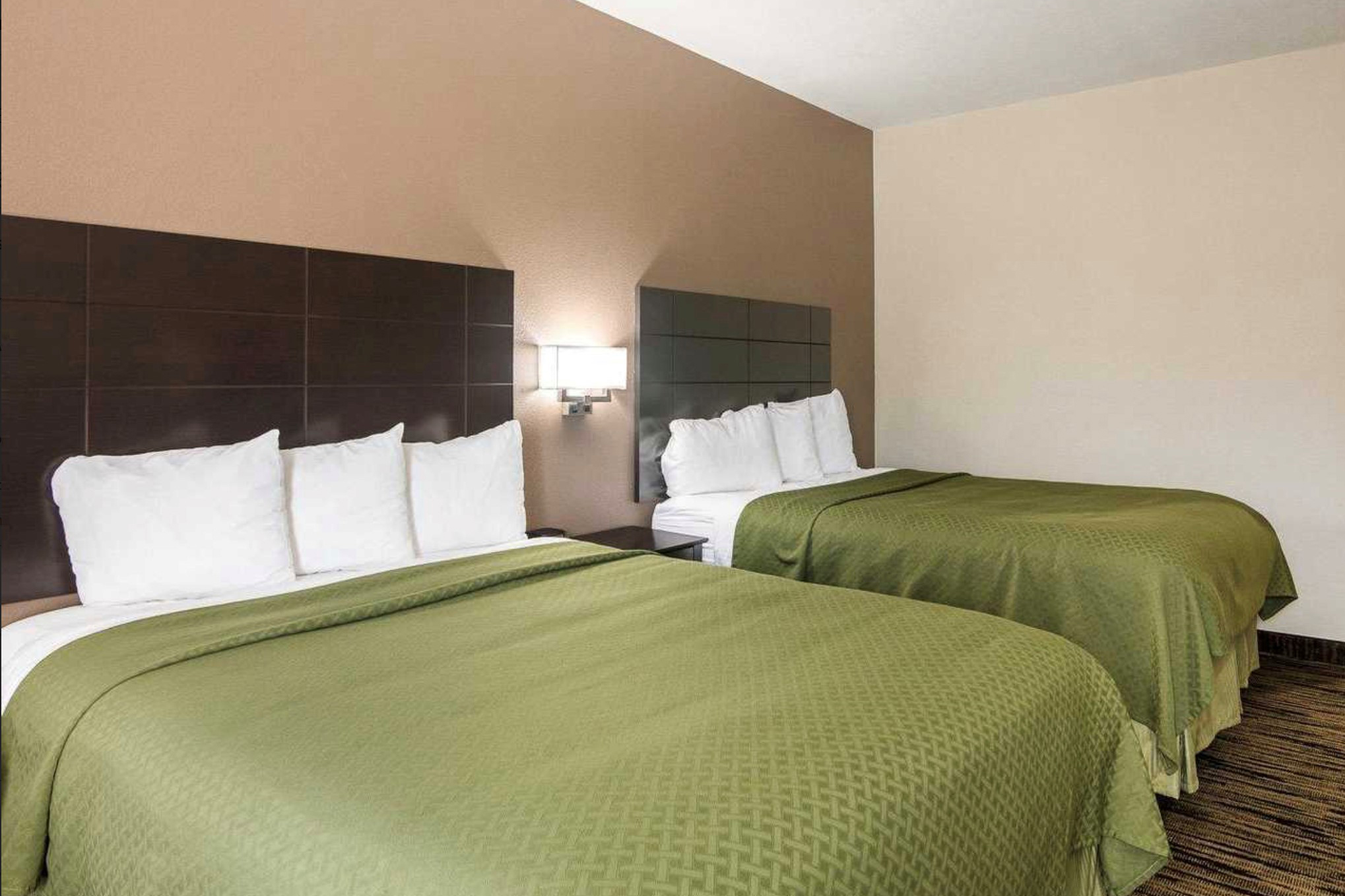 Guest room at the Days Inn by Wyndham Fort Worth North / Fossil Creek in Fort Worth, Texas
