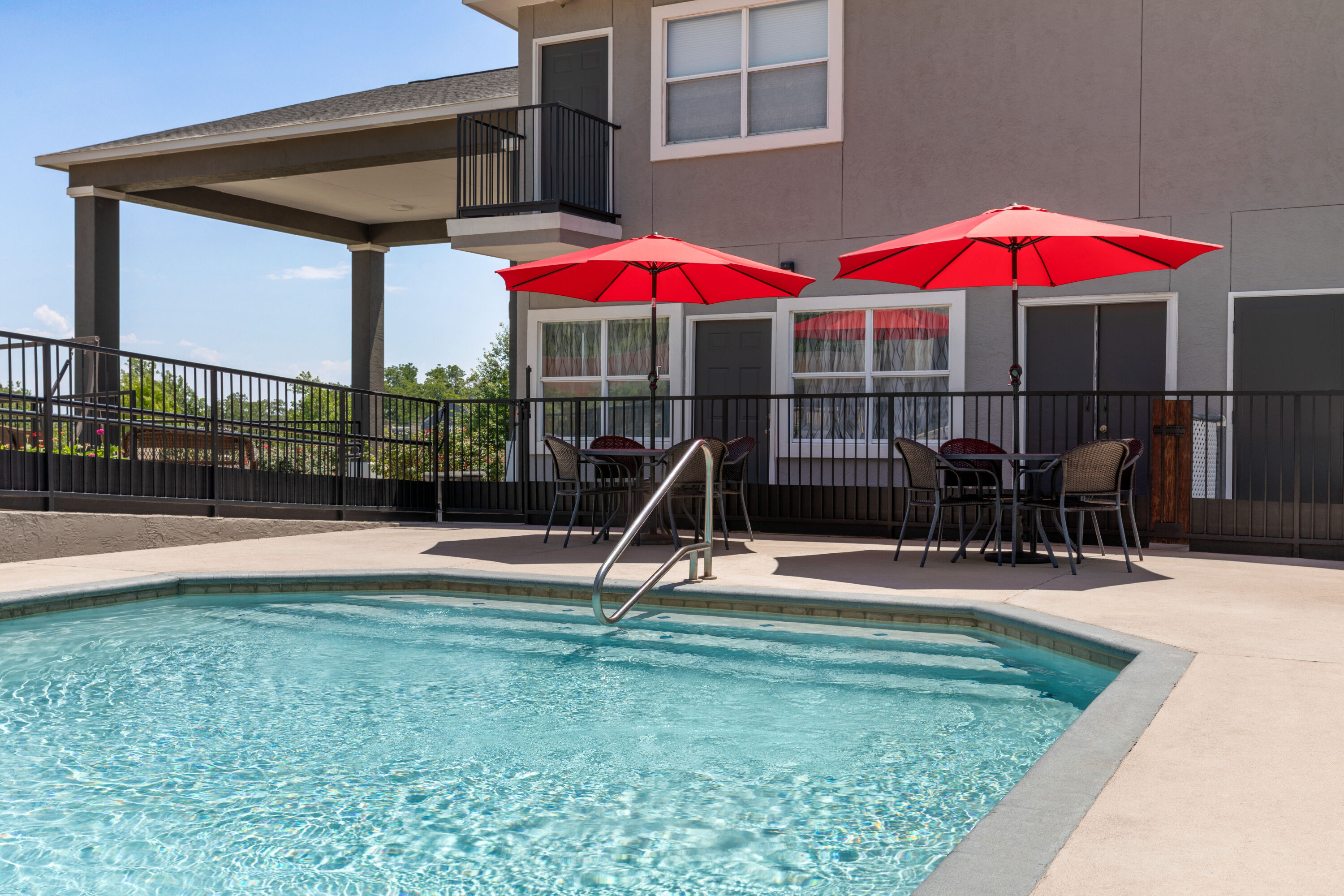 Family pool at the Days Inn by Wyndham Suites Fredericksburg in Fredericksburg, Texas