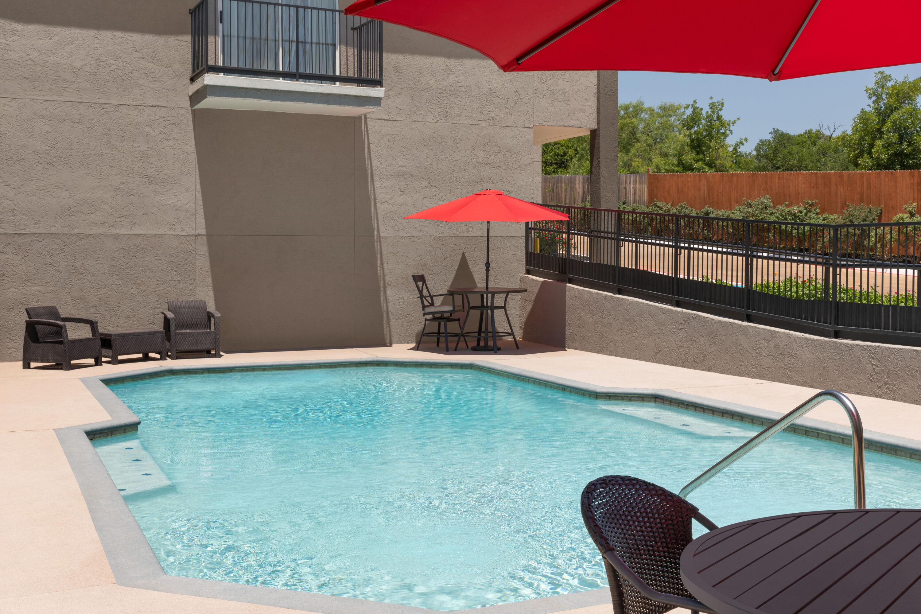 Family pool at the Days Inn by Wyndham Suites Fredericksburg in Fredericksburg, Texas