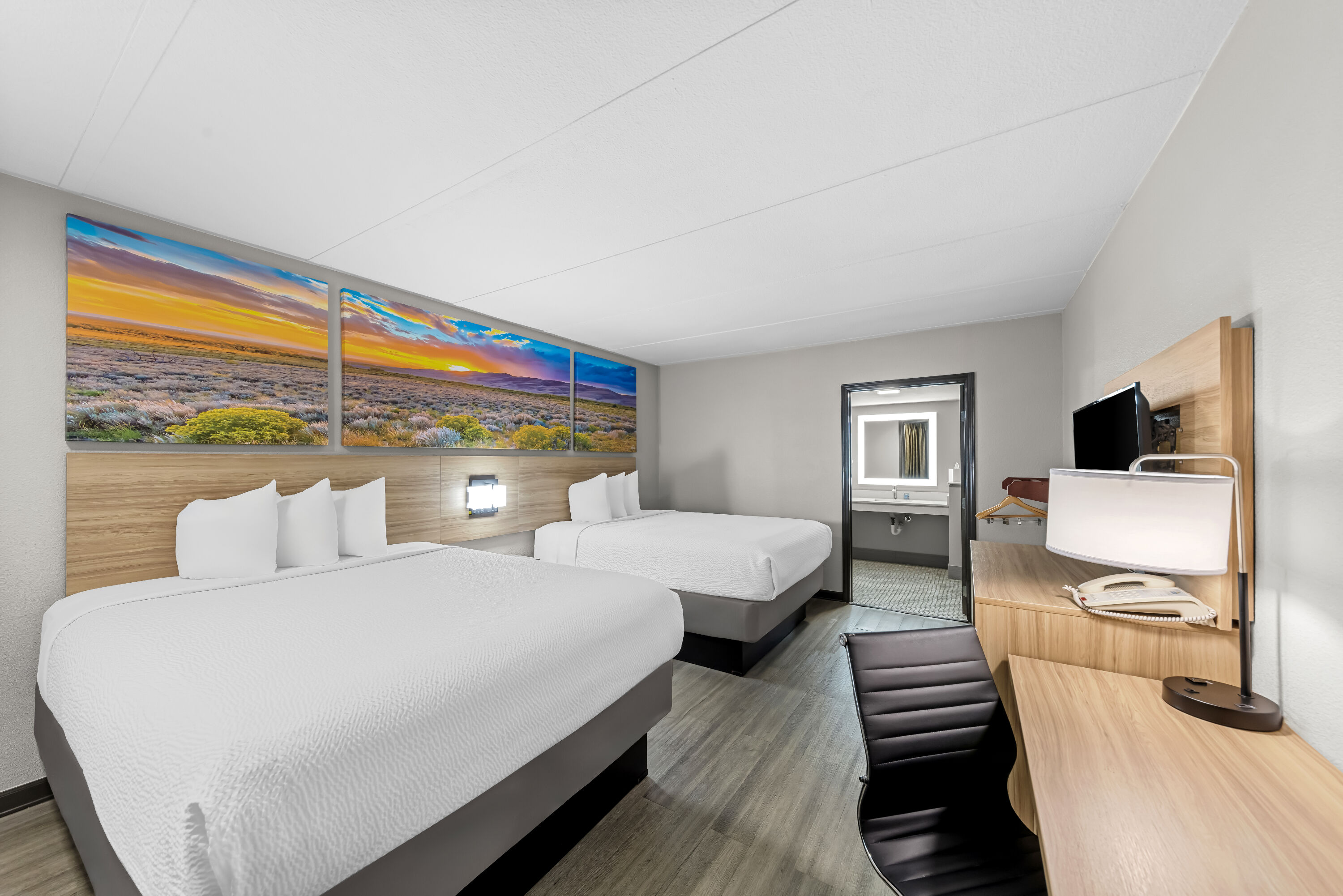 Double bed guest room at the Days Inn by Wyndham Gainesville in Gainesville, Texas