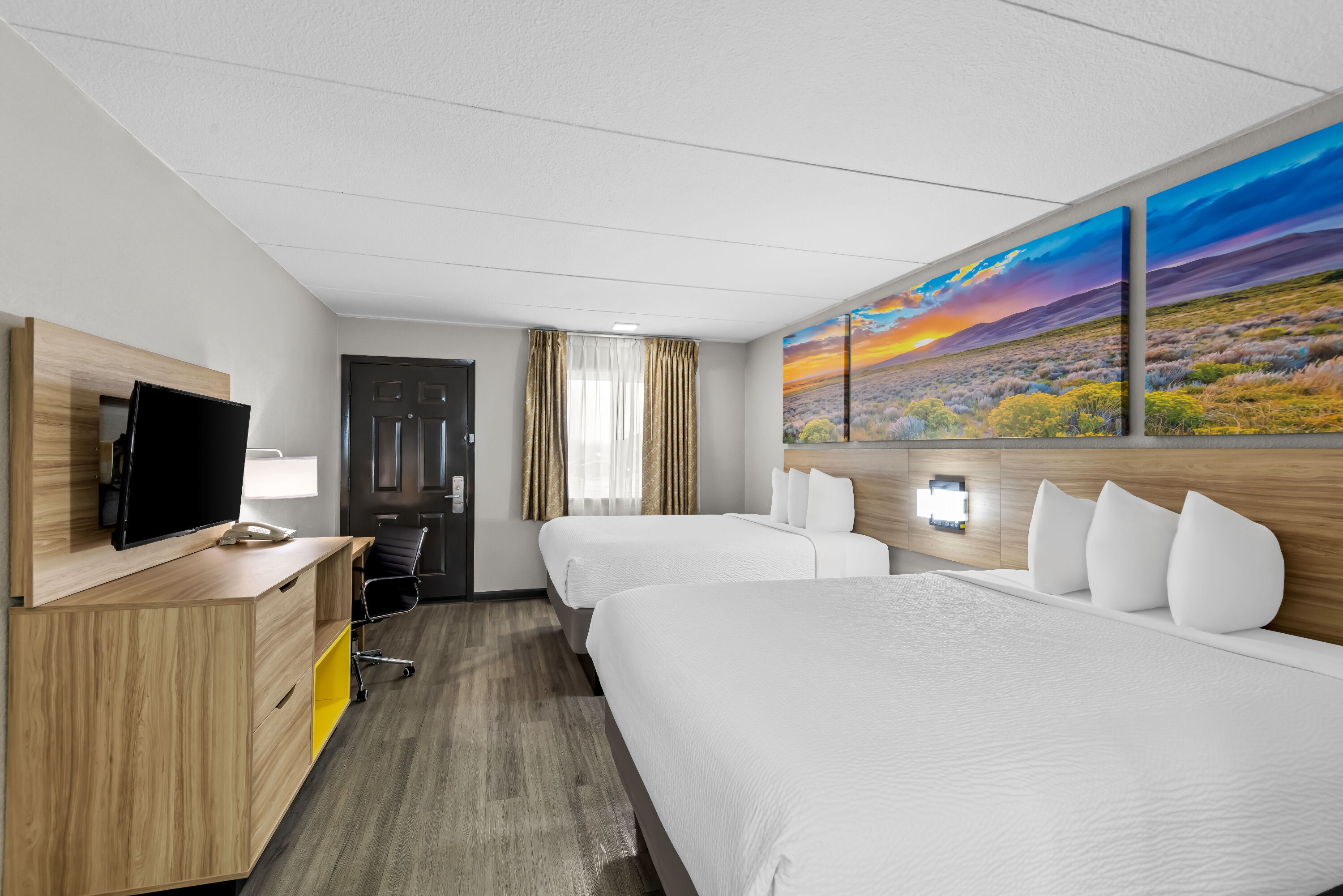 Double bed guest room at the Days Inn by Wyndham Gainesville in Gainesville, Texas