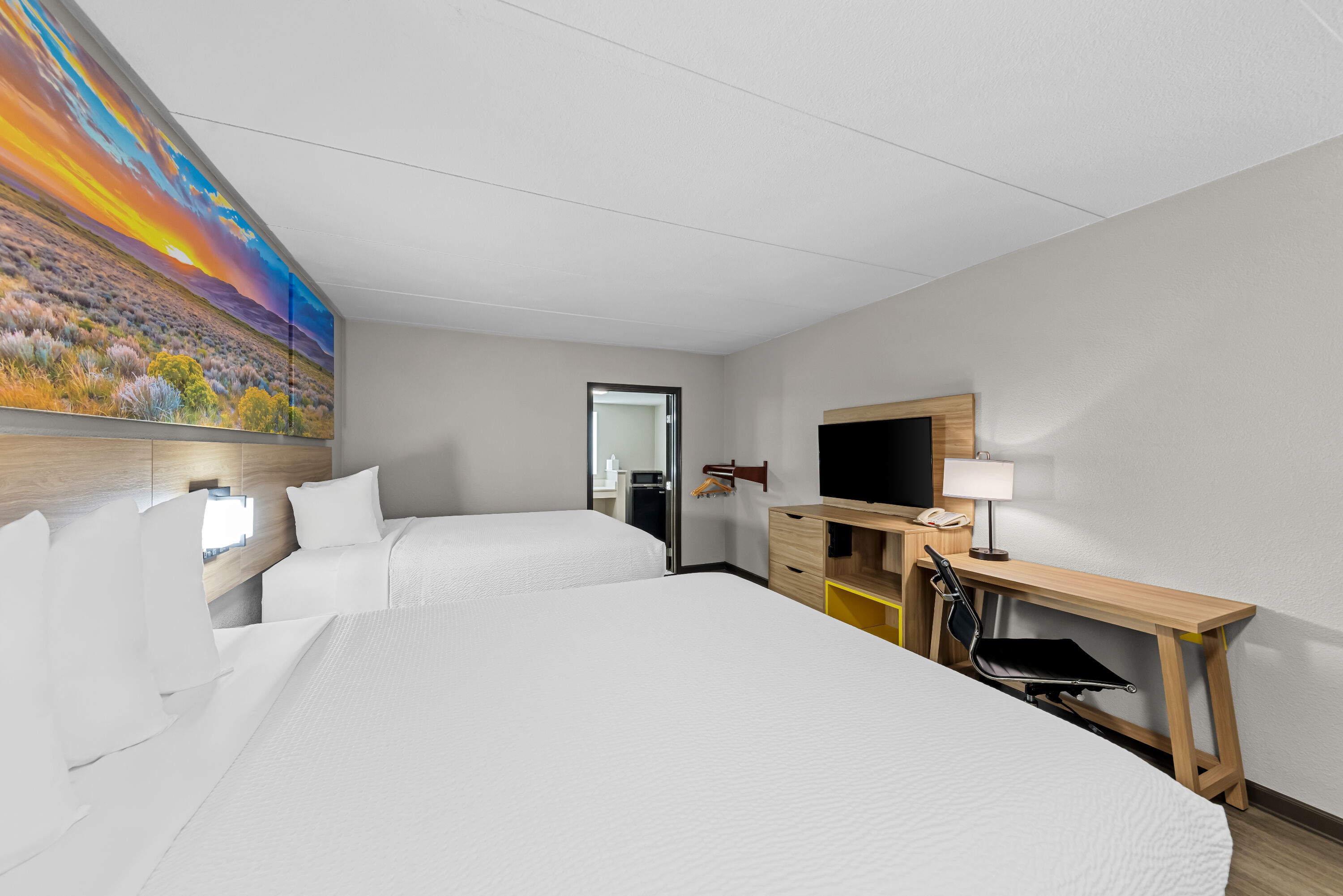 Double bed guest room at the Days Inn by Wyndham Gainesville in Gainesville, Texas