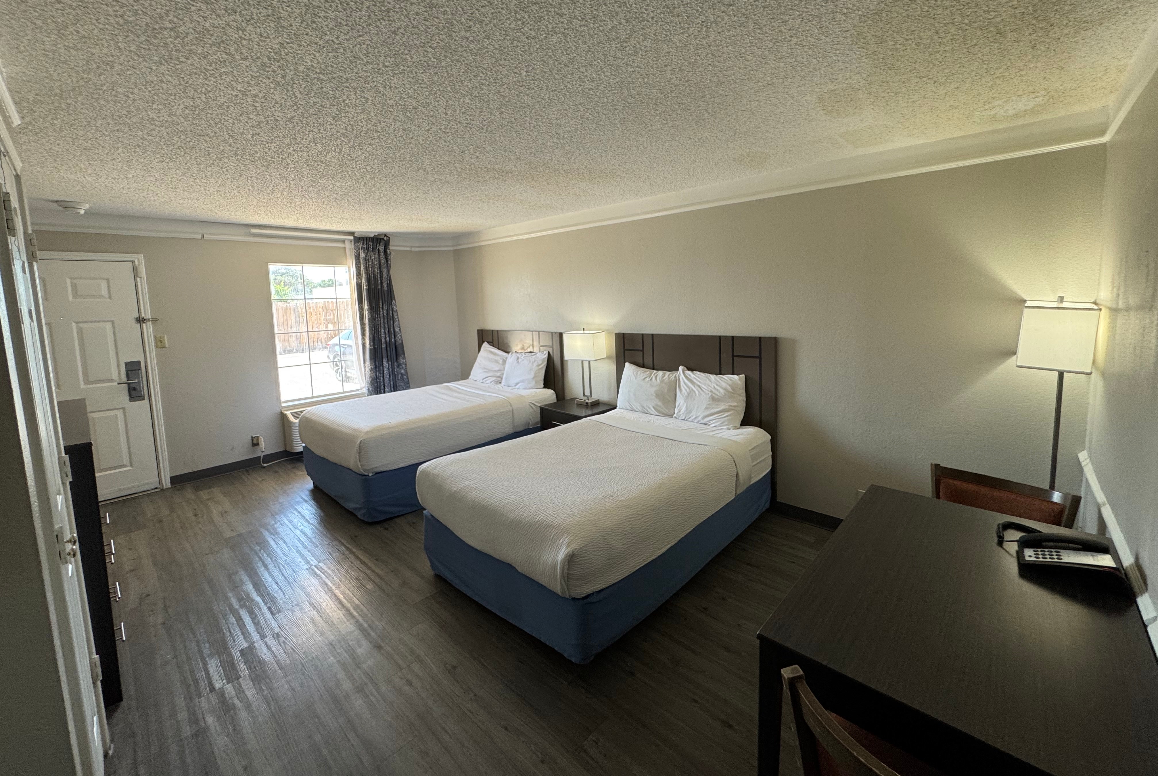 Double bed guest room at the Days Inn by Wyndham Georgetown in Georgetown, Texas