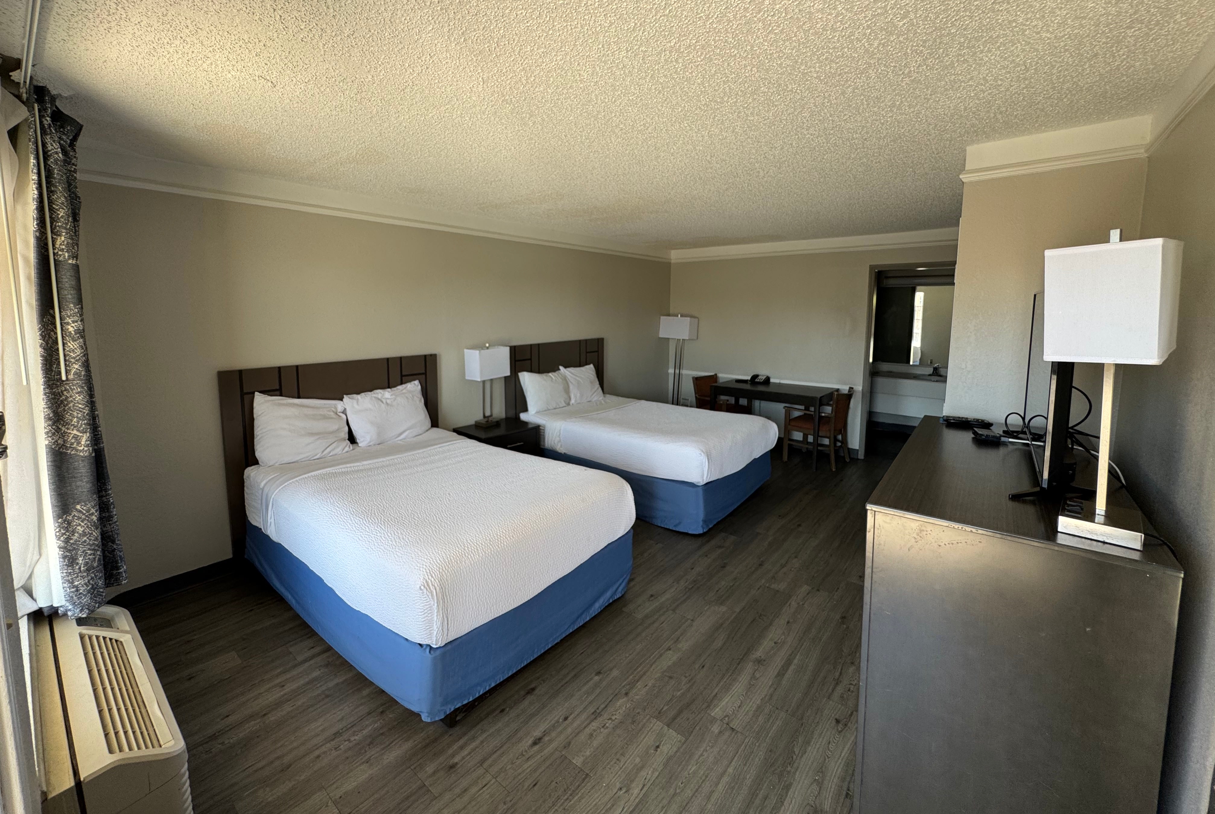 Double bed guest room at the Days Inn by Wyndham Georgetown in Georgetown, Texas