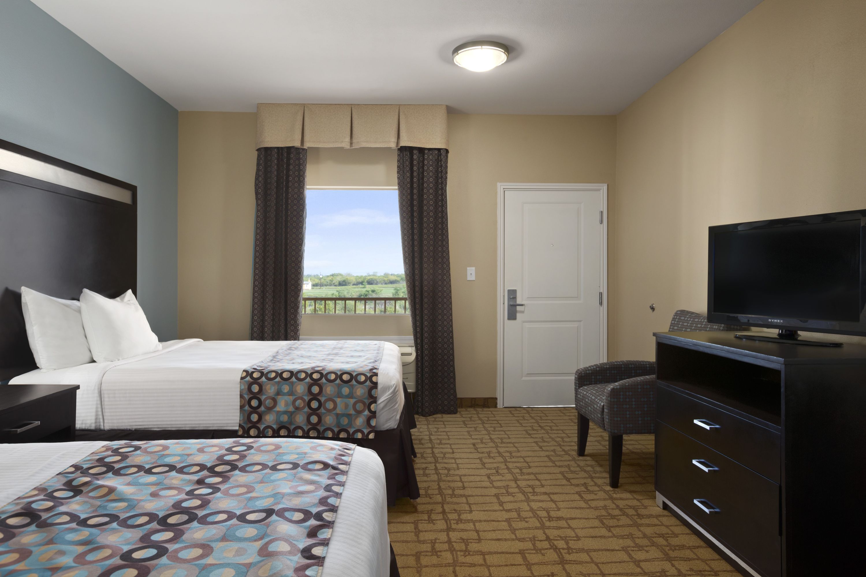 Guest room at the Days Inn & Suites by Wyndham Gonzales TX in Gonzales, Texas