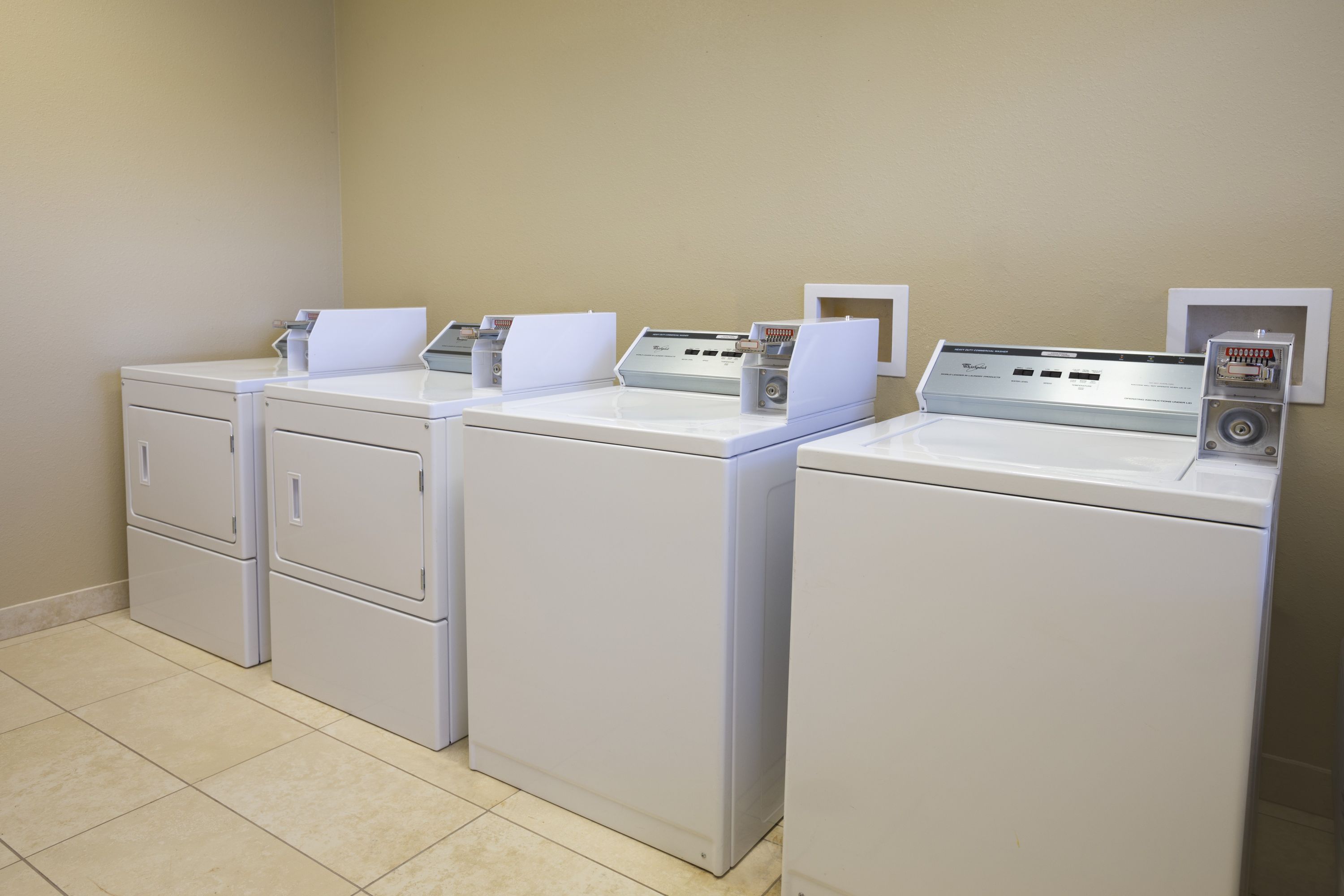 Laundry facilities at Days Inn & Suites by Wyndham Gonzales TX in Gonzales, Texas