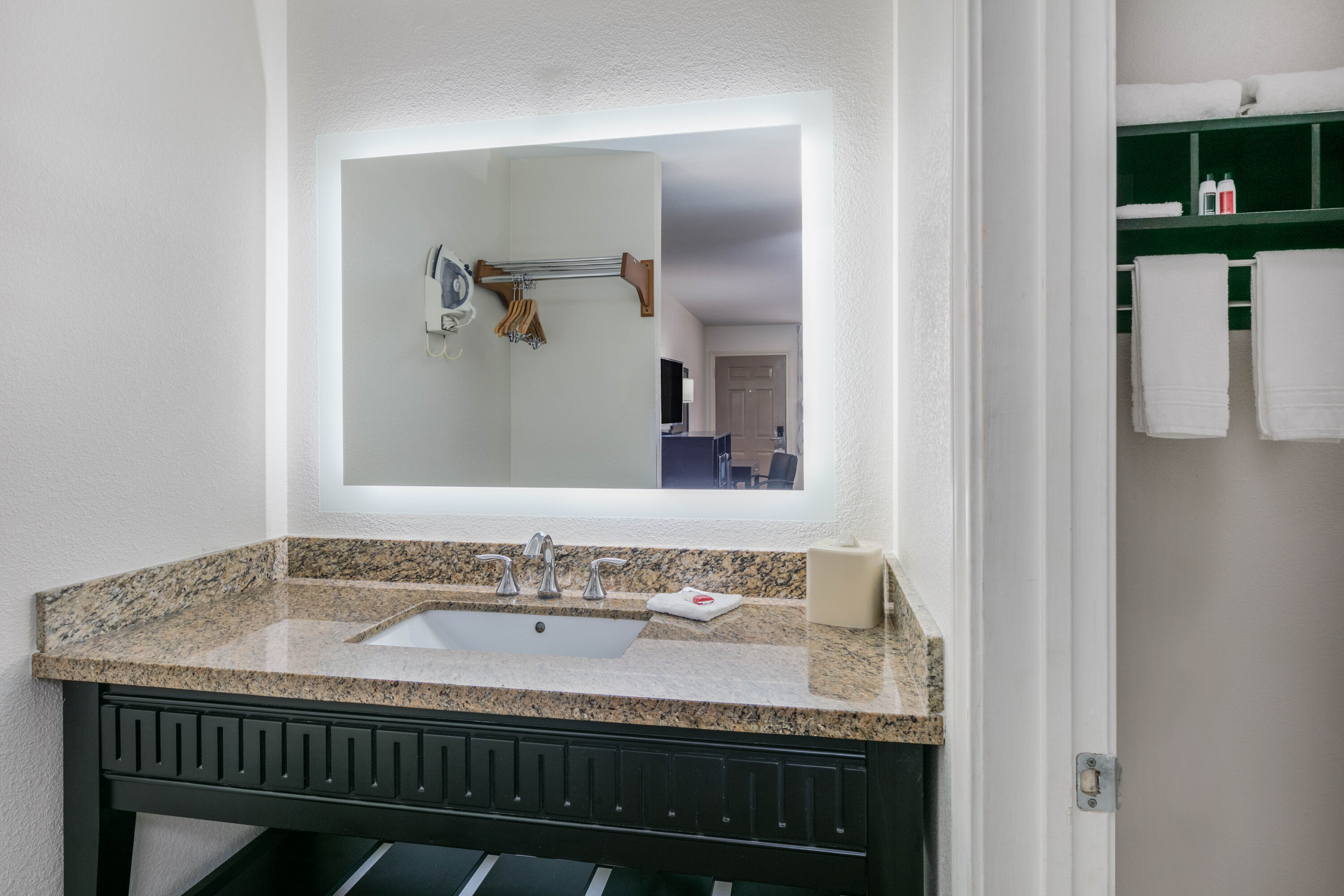 Guest room bath at the Days Inn by Wyndham Granbury in Granbury, Texas