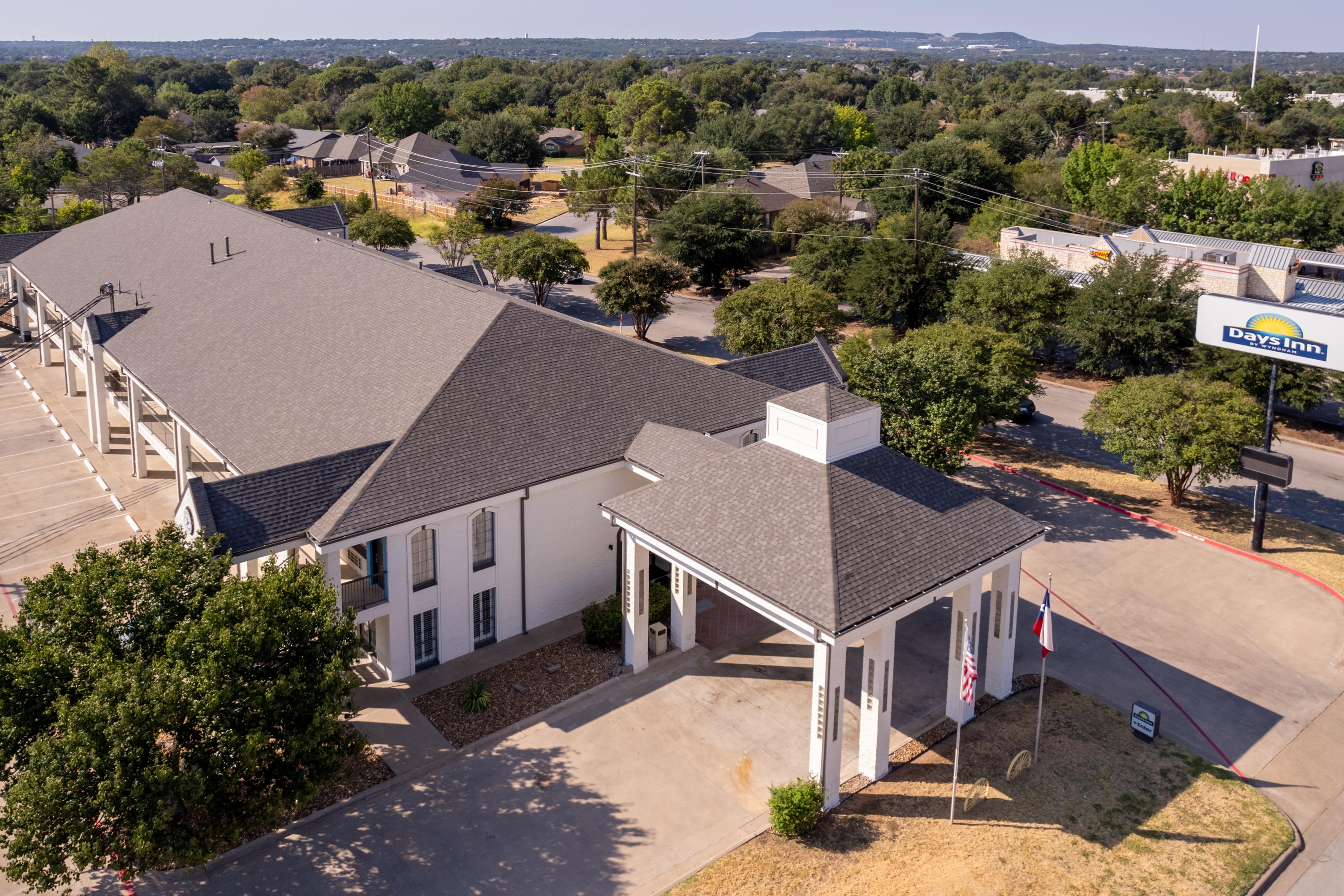 Exterior of Days Inn by Wyndham Granbury hotel in Granbury, Texas