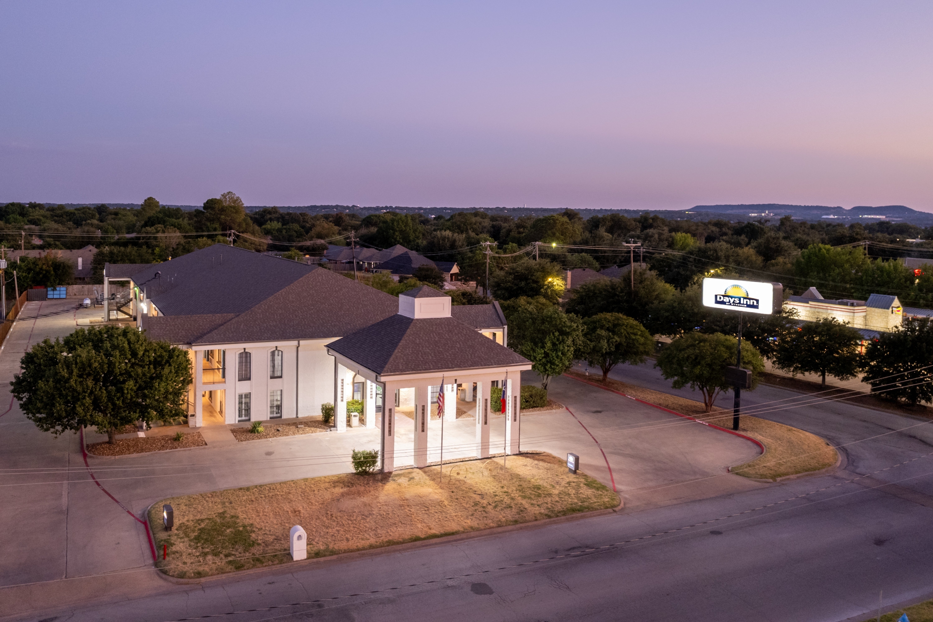 Exterior of Days Inn by Wyndham Granbury hotel in Granbury, Texas