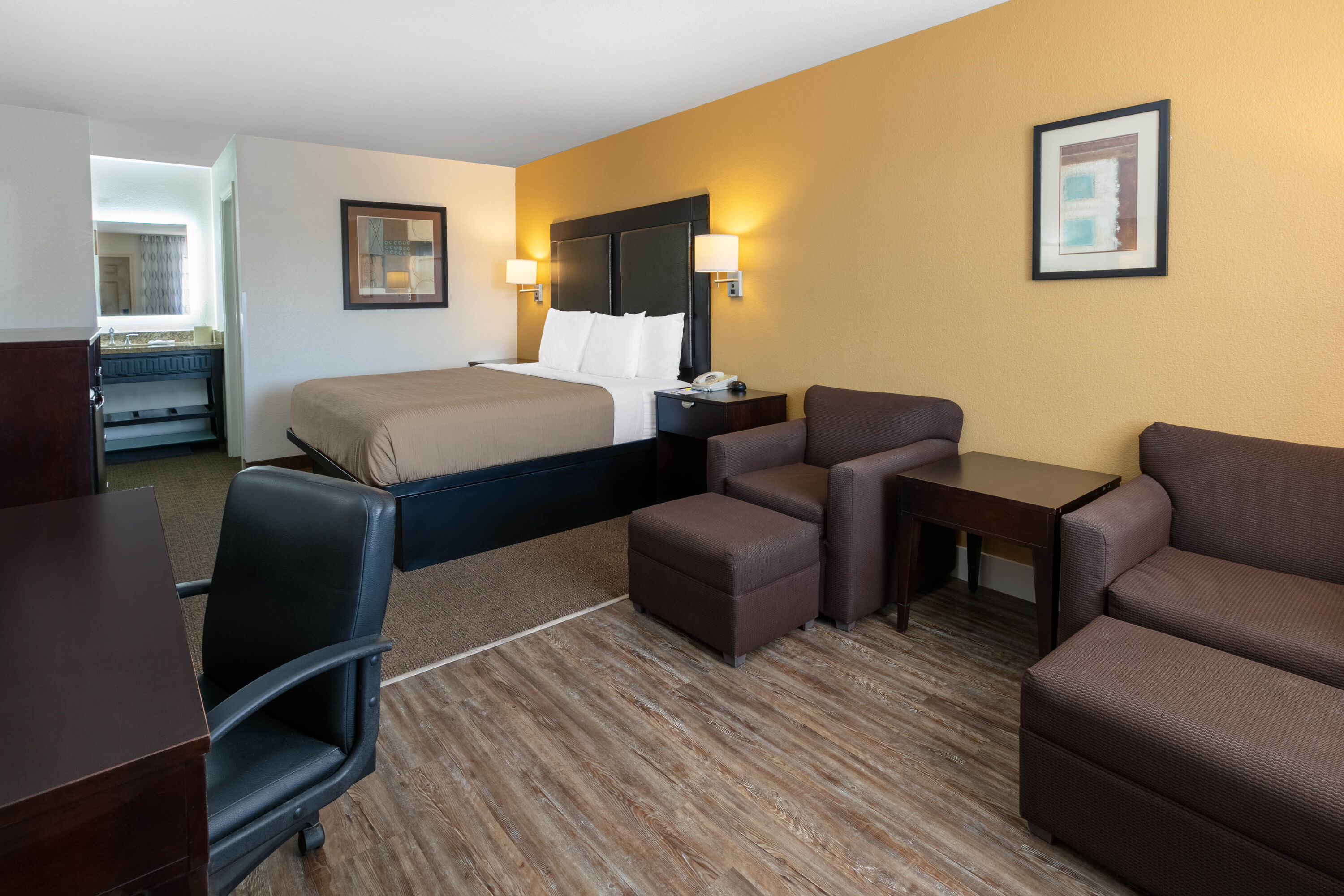 Guest room at the Days Inn by Wyndham Granbury in Granbury, Texas