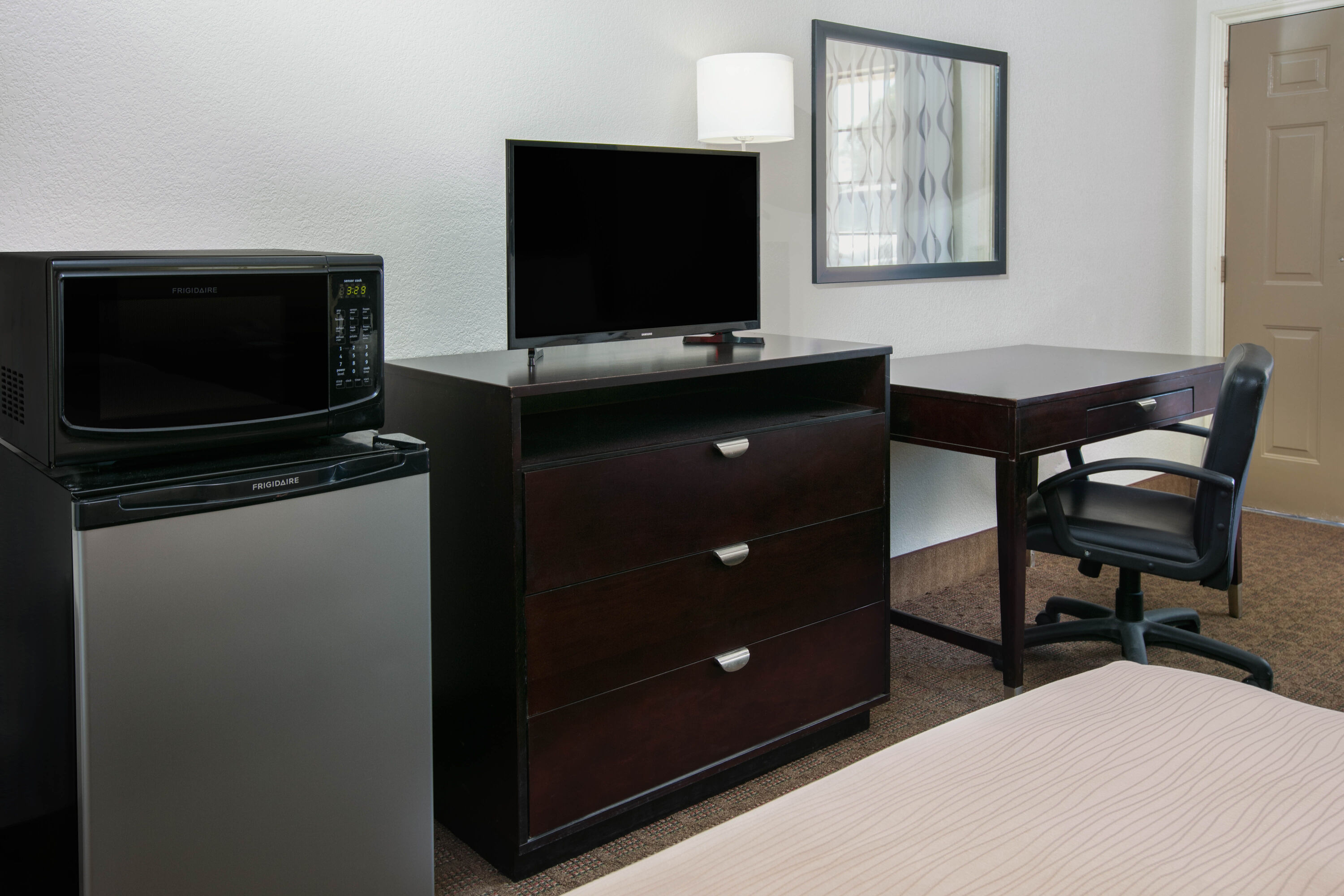 Guest room feature at the Days Inn by Wyndham Granbury in Granbury, Texas