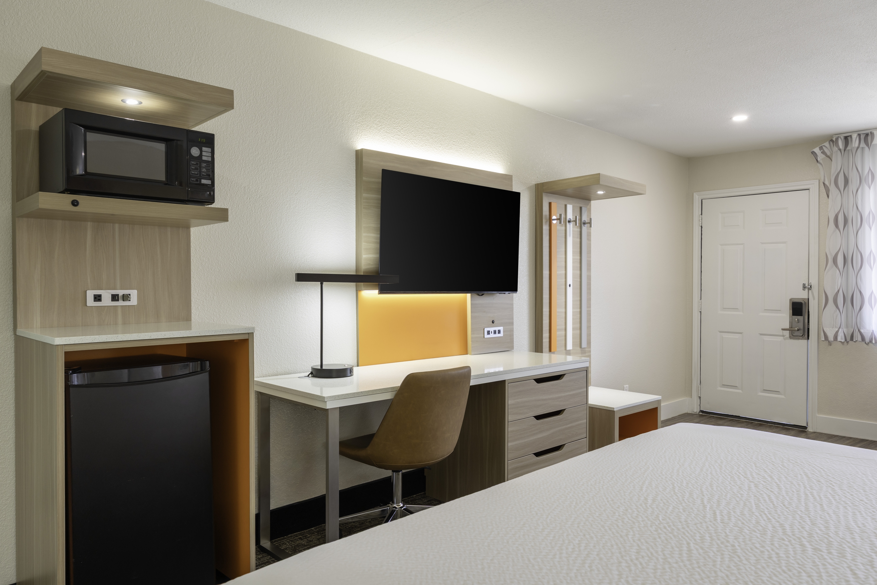 Guest room at the Days Inn by Wyndham Granbury in Granbury, Texas