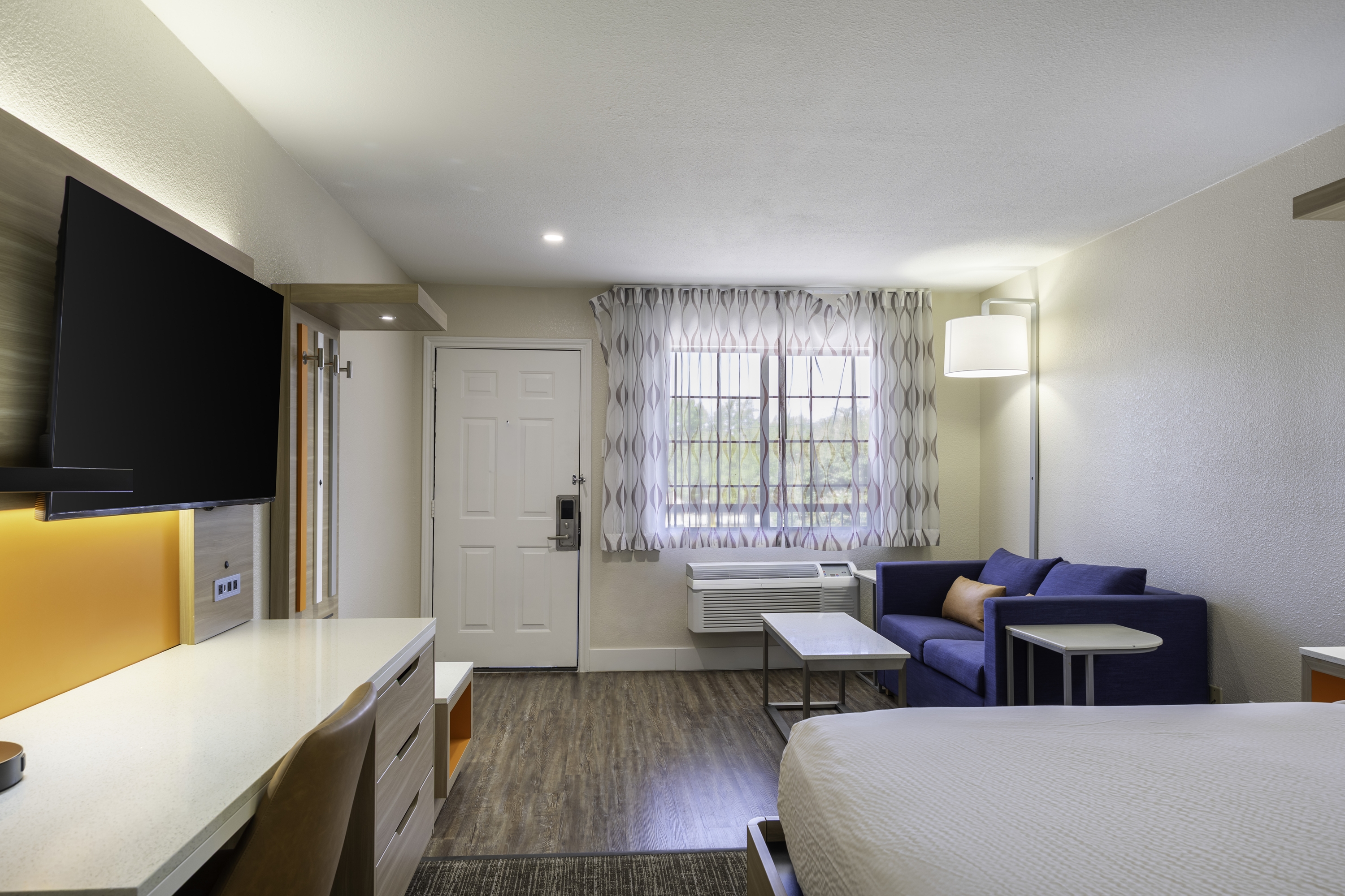 Guest room at the Days Inn by Wyndham Granbury in Granbury, Texas