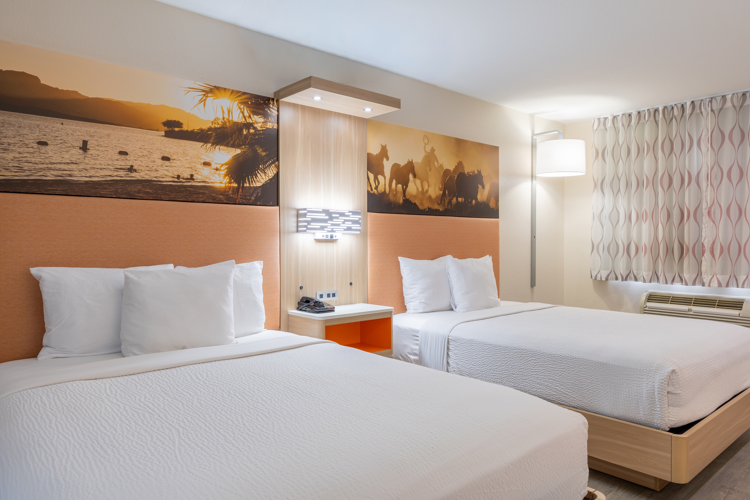 Guest room at the Days Inn by Wyndham Granbury in Granbury, Texas