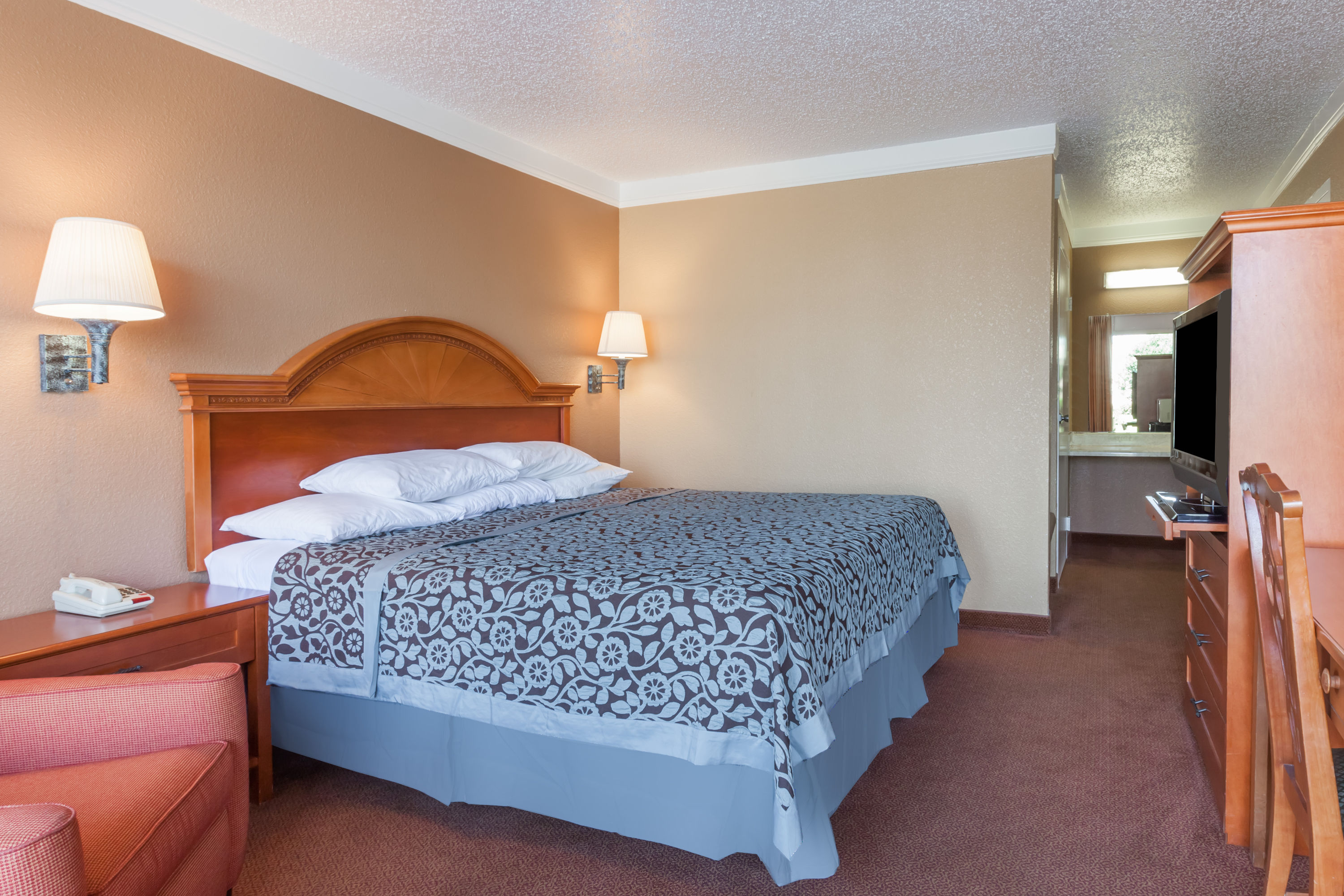 Guest room at the Days Inn by Wyndham Hillsboro TX in Hillsboro, Texas