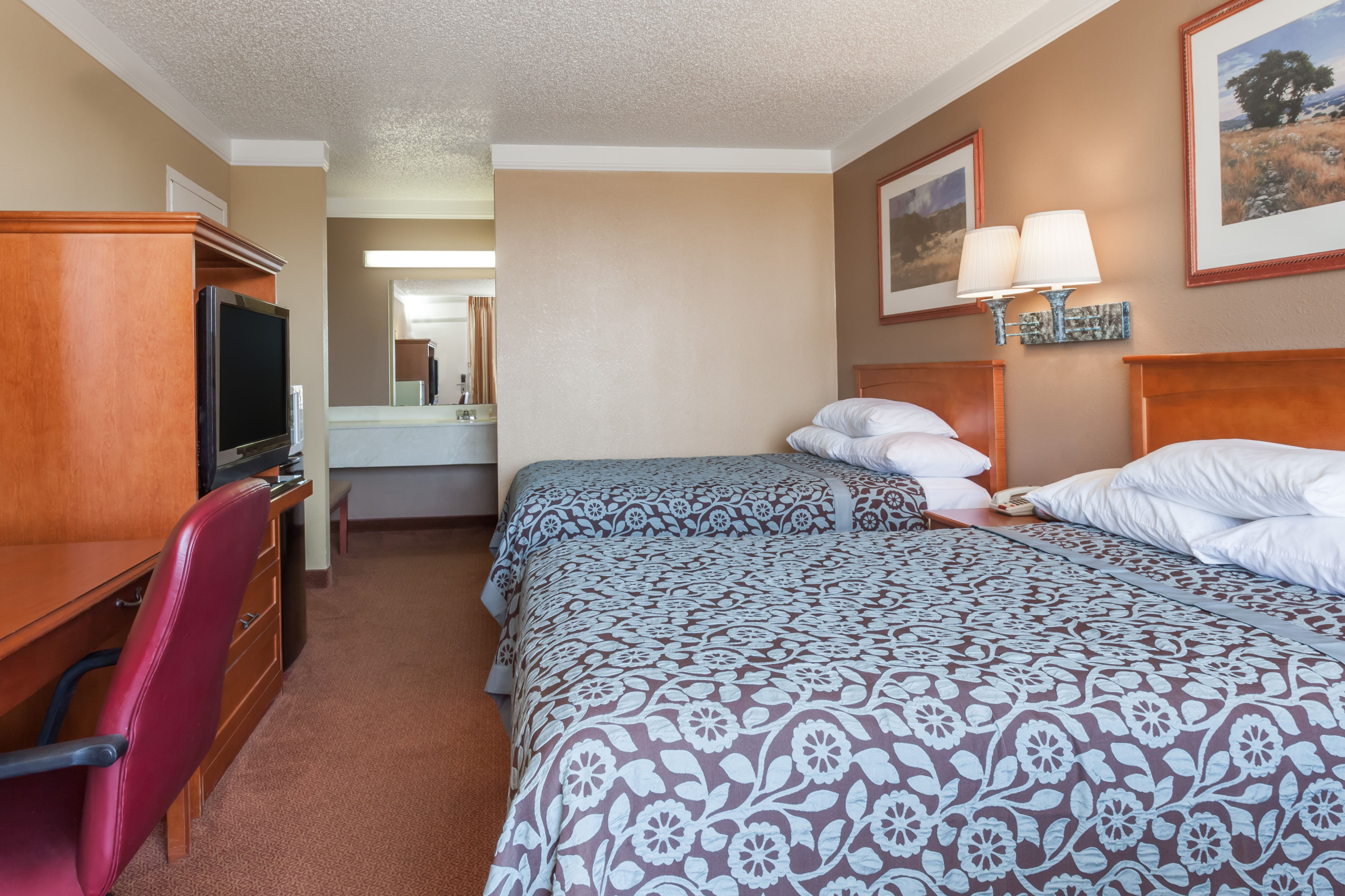 Guest room at the Days Inn by Wyndham Hillsboro TX in Hillsboro, Texas