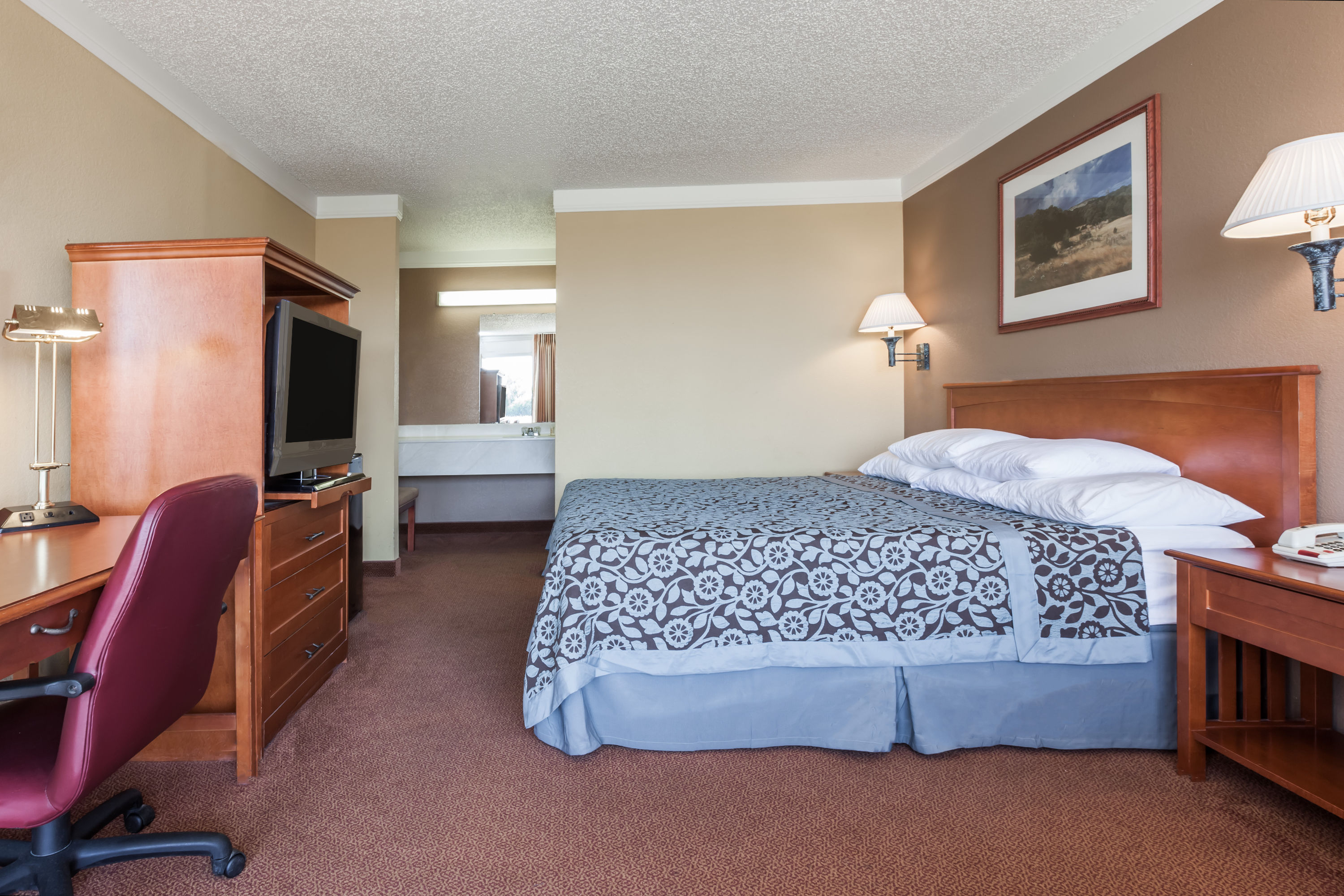 Guest room at the Days Inn by Wyndham Hillsboro TX in Hillsboro, Texas