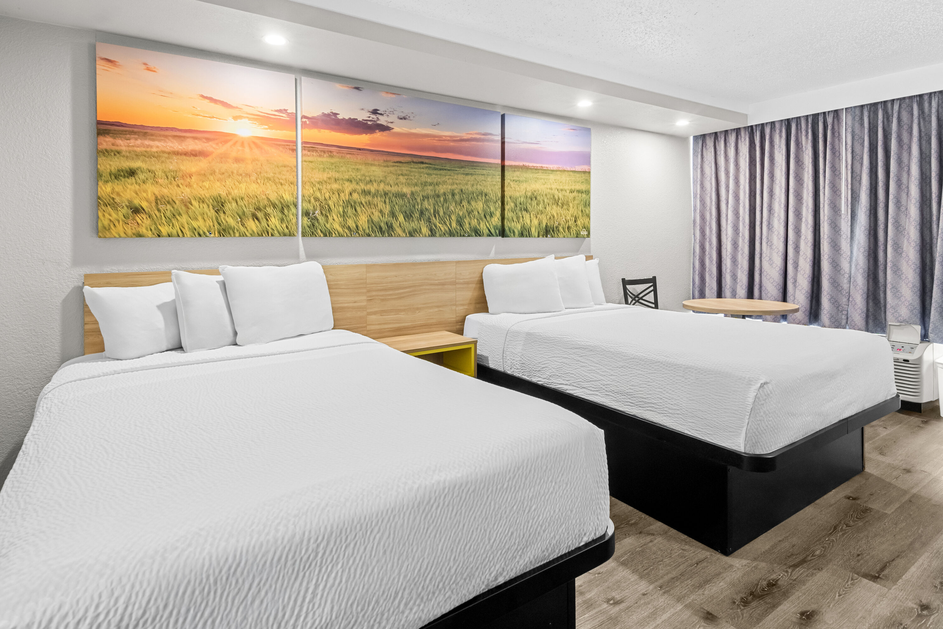 Double bed guest room at the Days Inn by Wyndham Hillsboro TX in Hillsboro, Texas