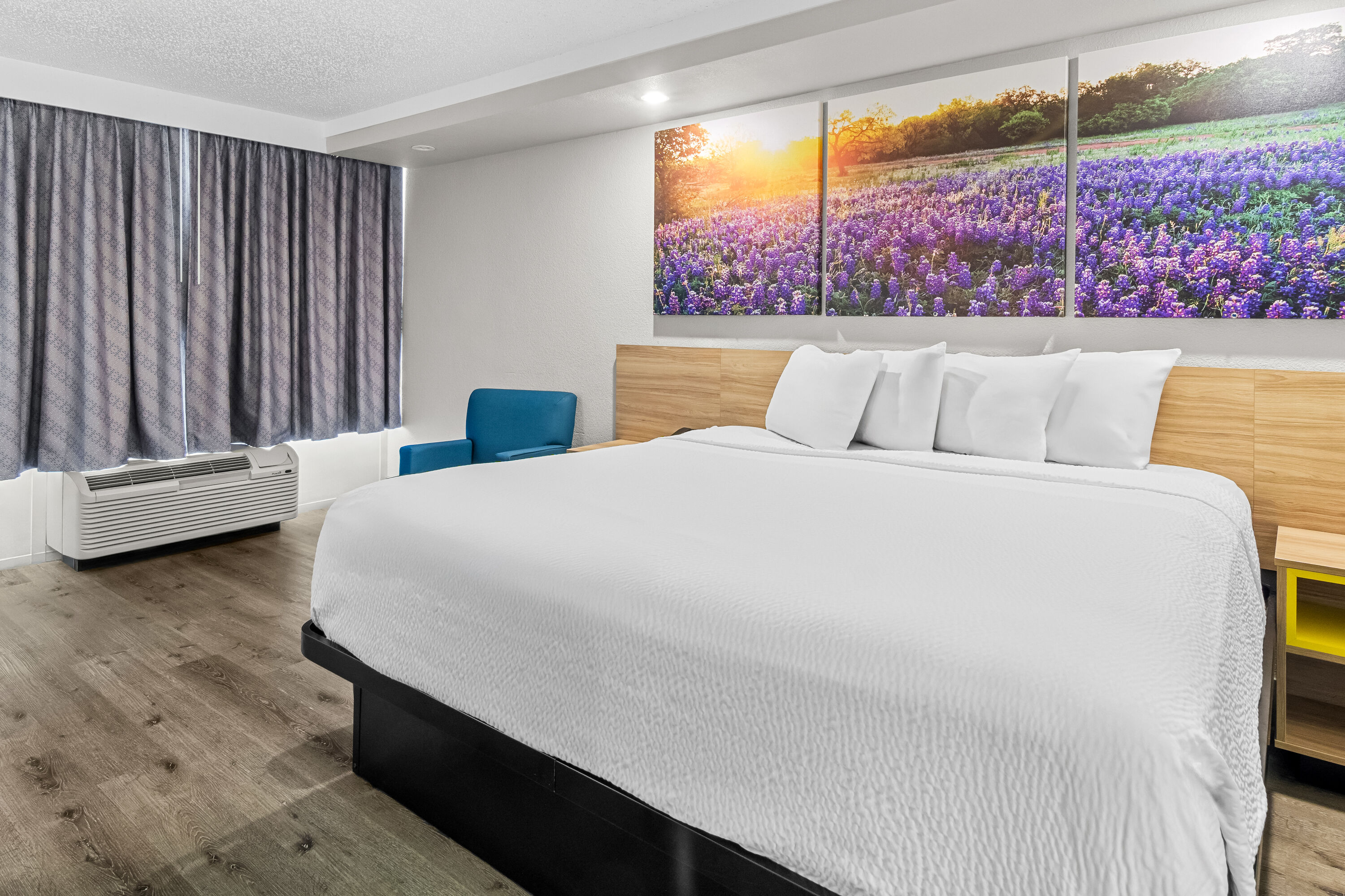 King bed guest room at the Days Inn by Wyndham Hillsboro TX in Hillsboro, Texas