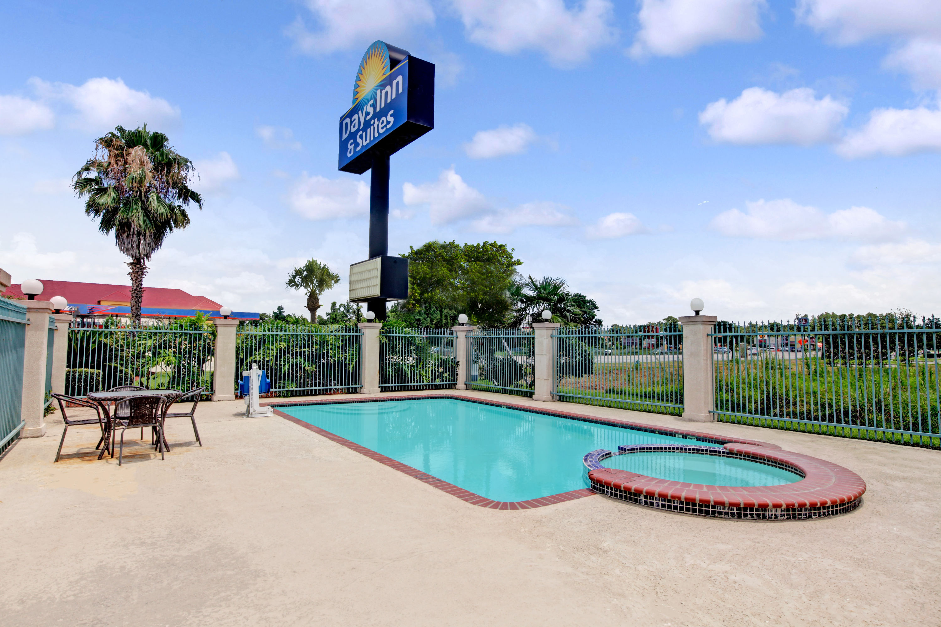 Pool at the Days Inn & Suites by Wyndham Houston North/Spring in Houston, Texas