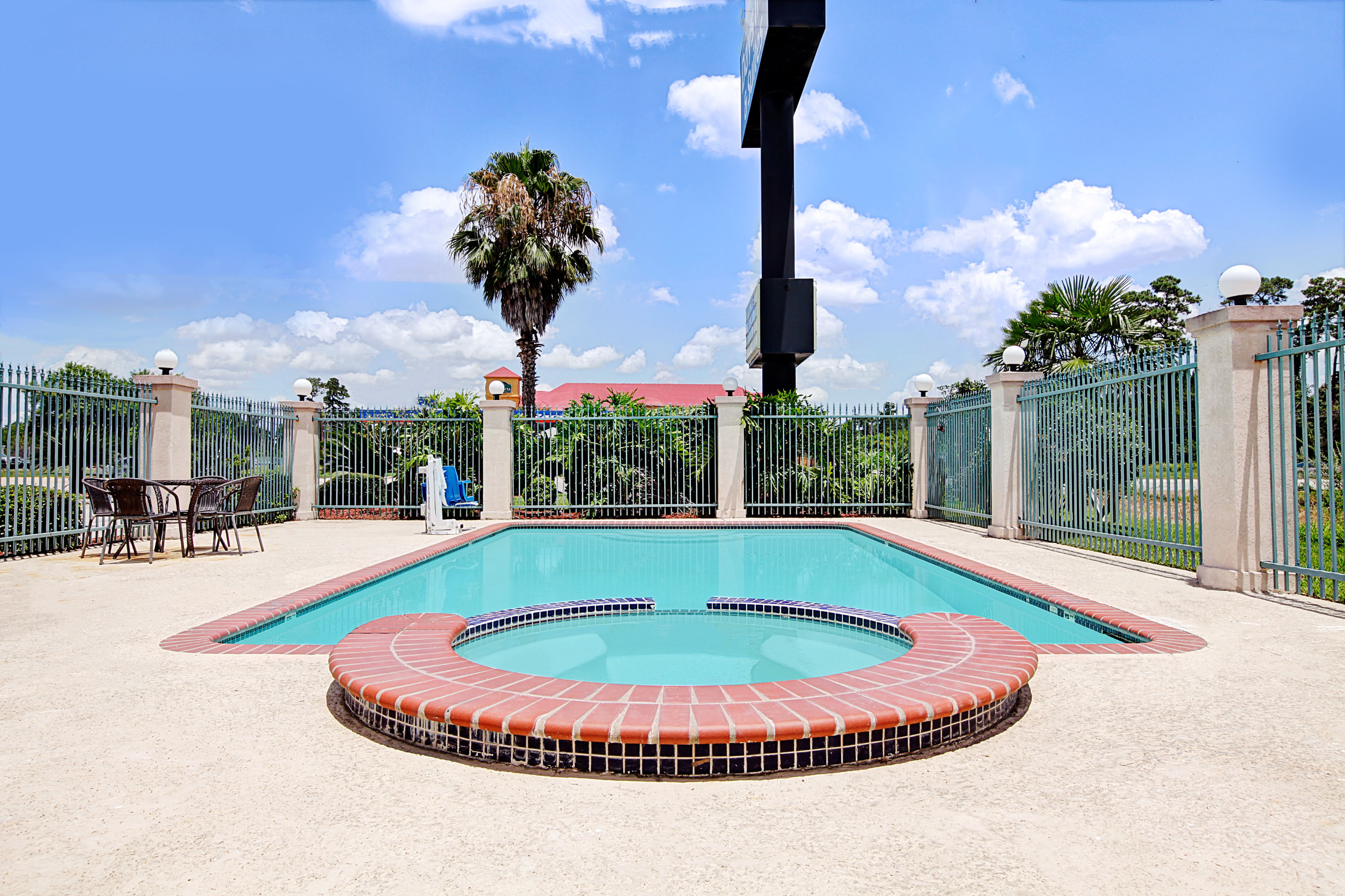 Pool at the Days Inn & Suites by Wyndham Houston North/Spring in Houston, Texas