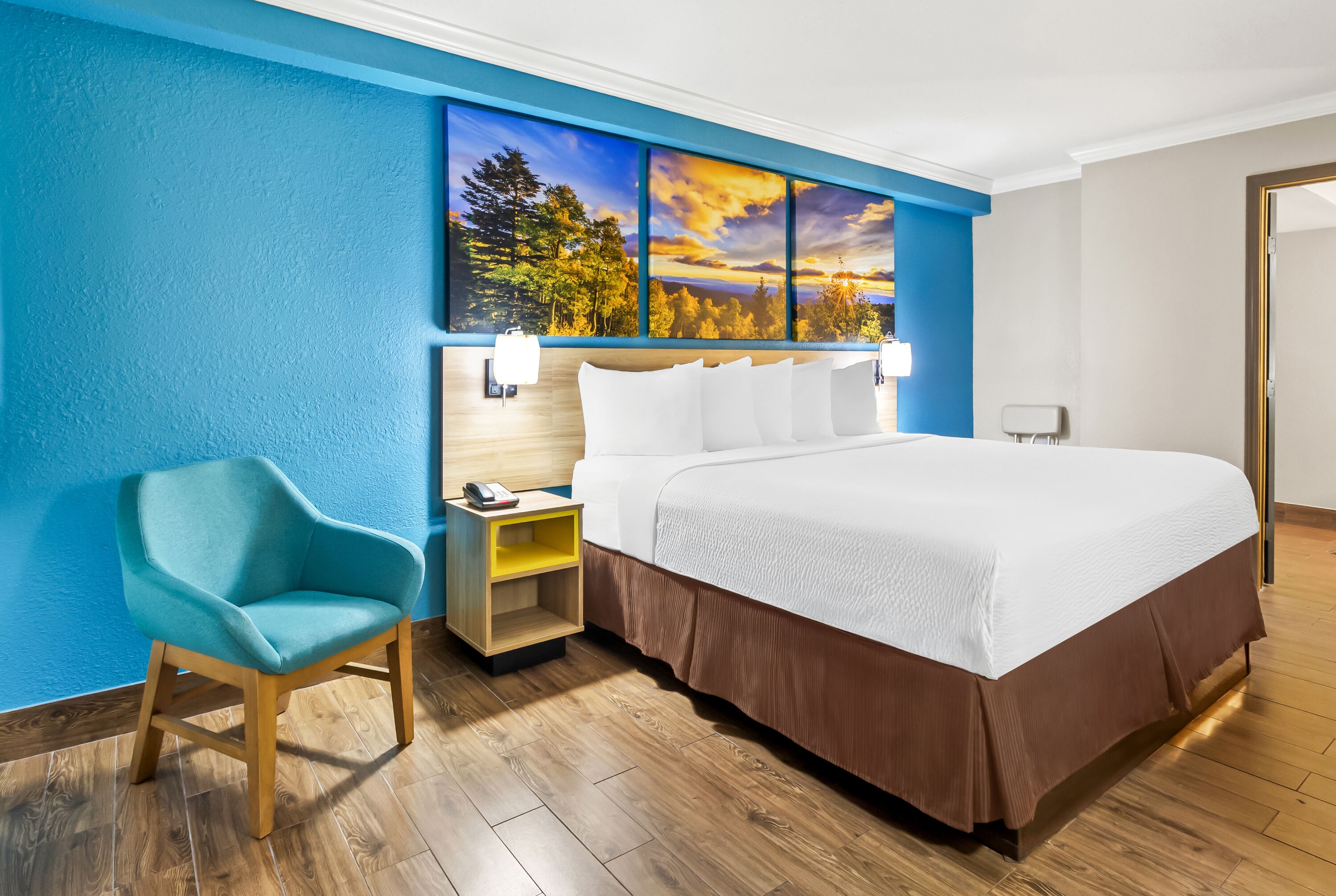 King bed guest room at the Days Inn by Wyndham Houston East in Houston, Texas