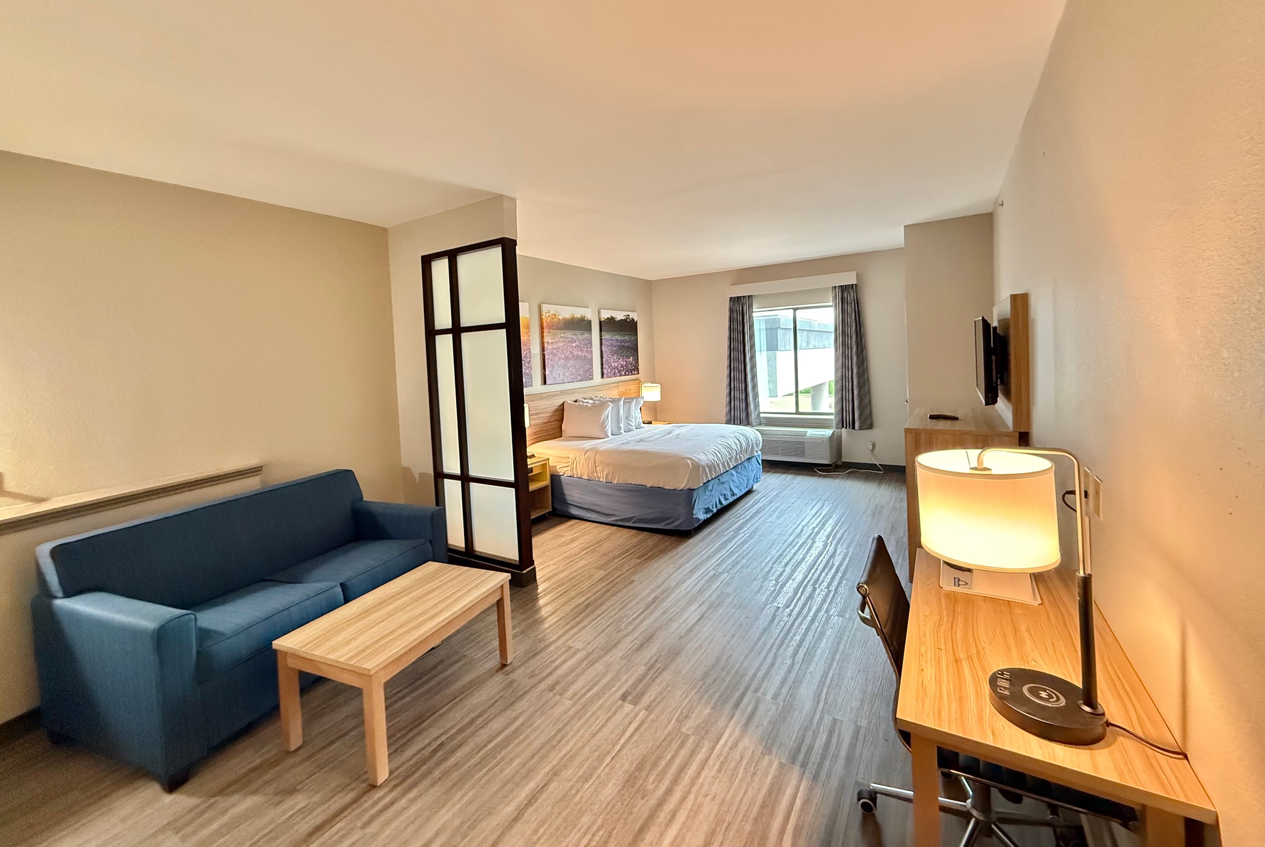 Guest room at the Days Inn & Suites by Wyndham Houston / West Energy Corridor in Houston, Texas