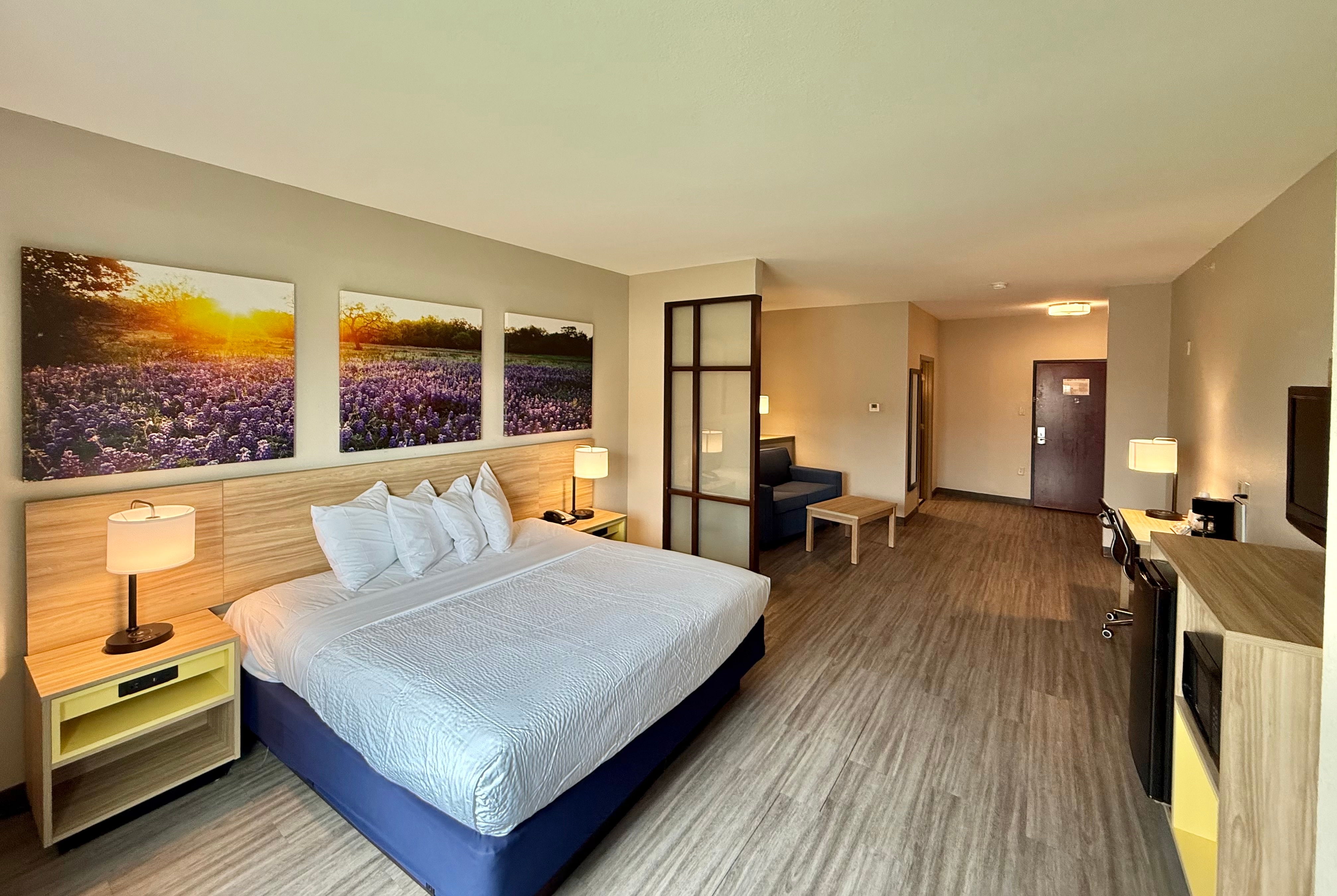 Guest room at the Days Inn & Suites by Wyndham Houston / West Energy Corridor in Houston, Texas