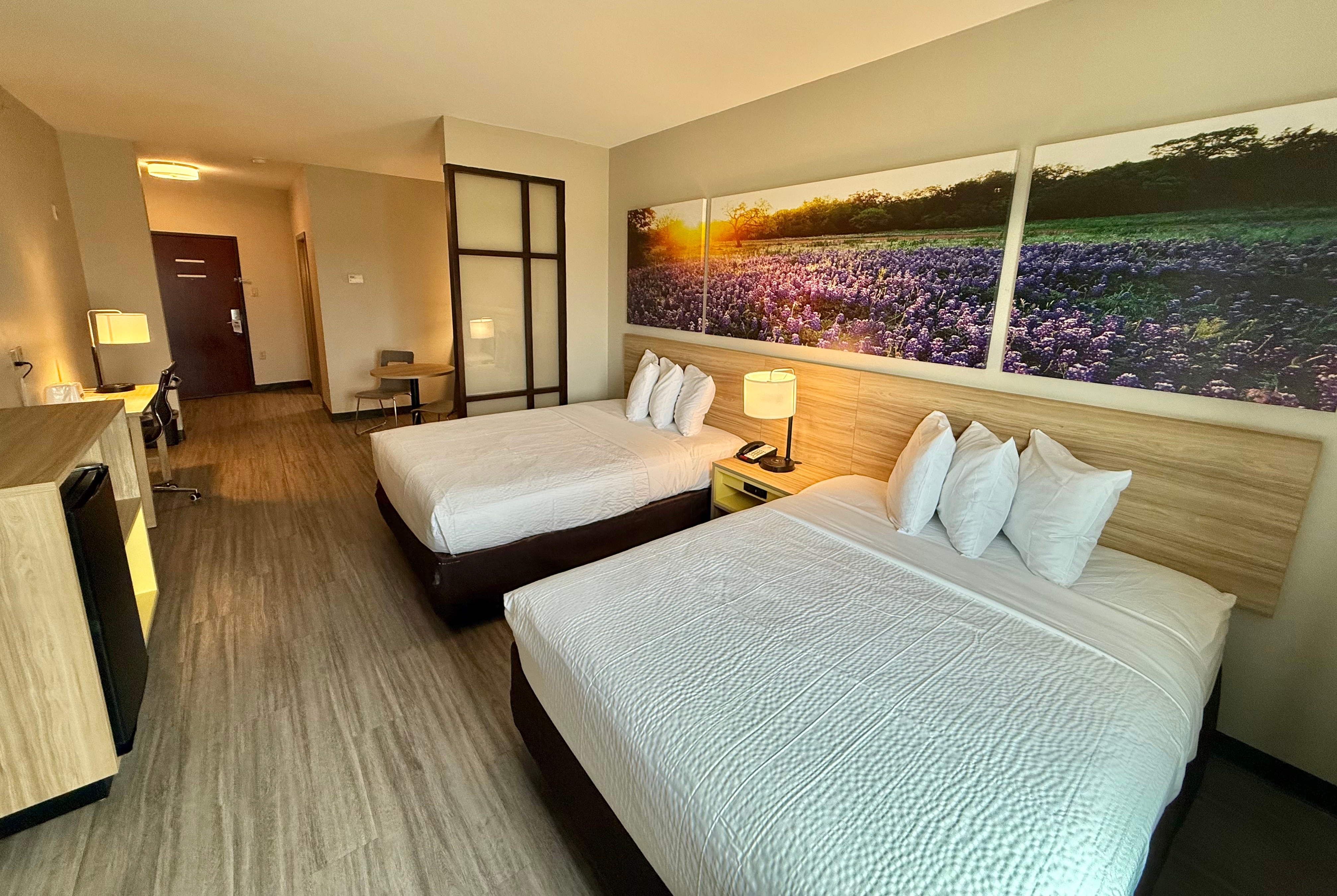 Guest room at the Days Inn & Suites by Wyndham Houston / West Energy Corridor in Houston, Texas