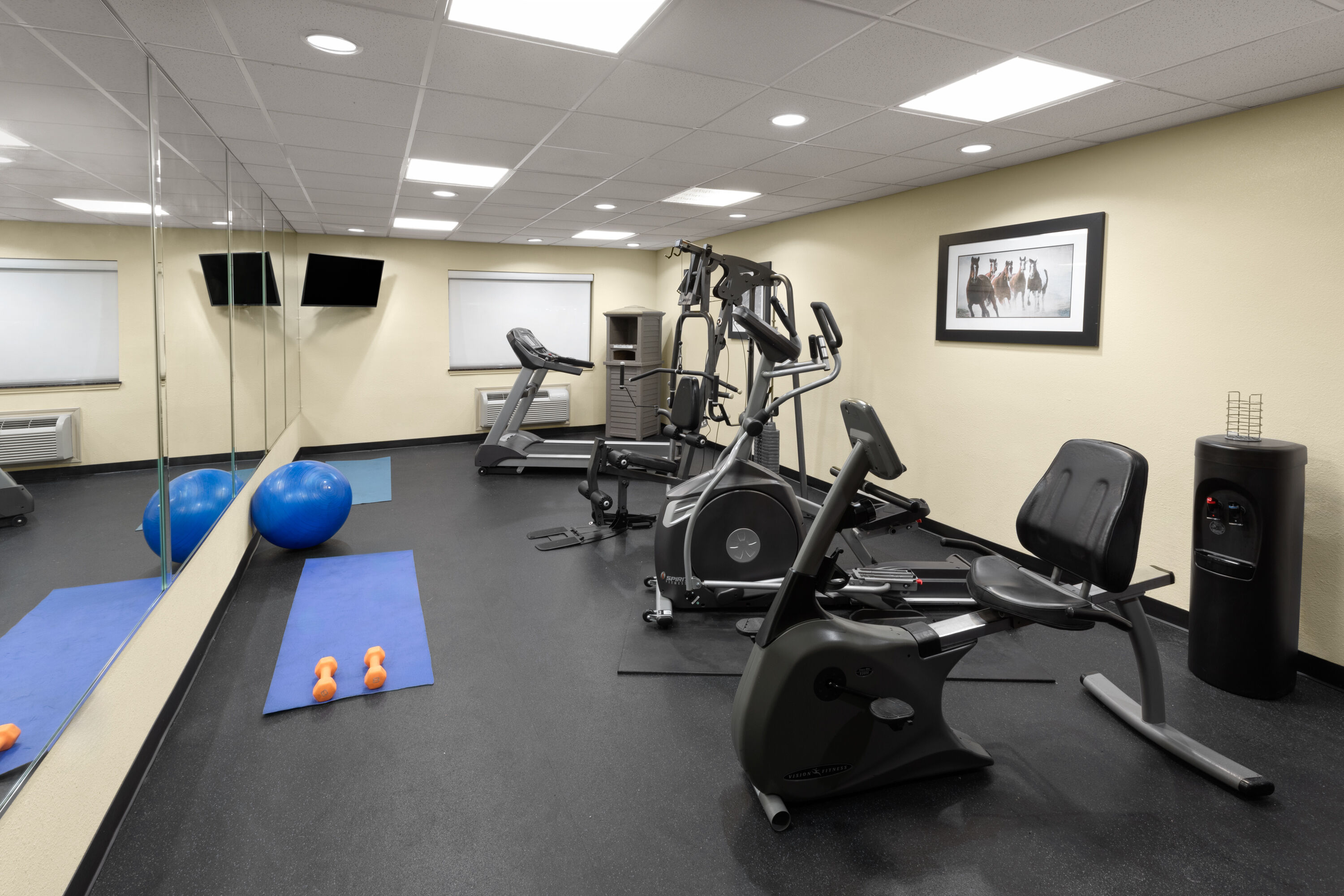 Fitness room at Days Inn & Suites by Wyndham Sam Houston Tollway in Houston, Texas