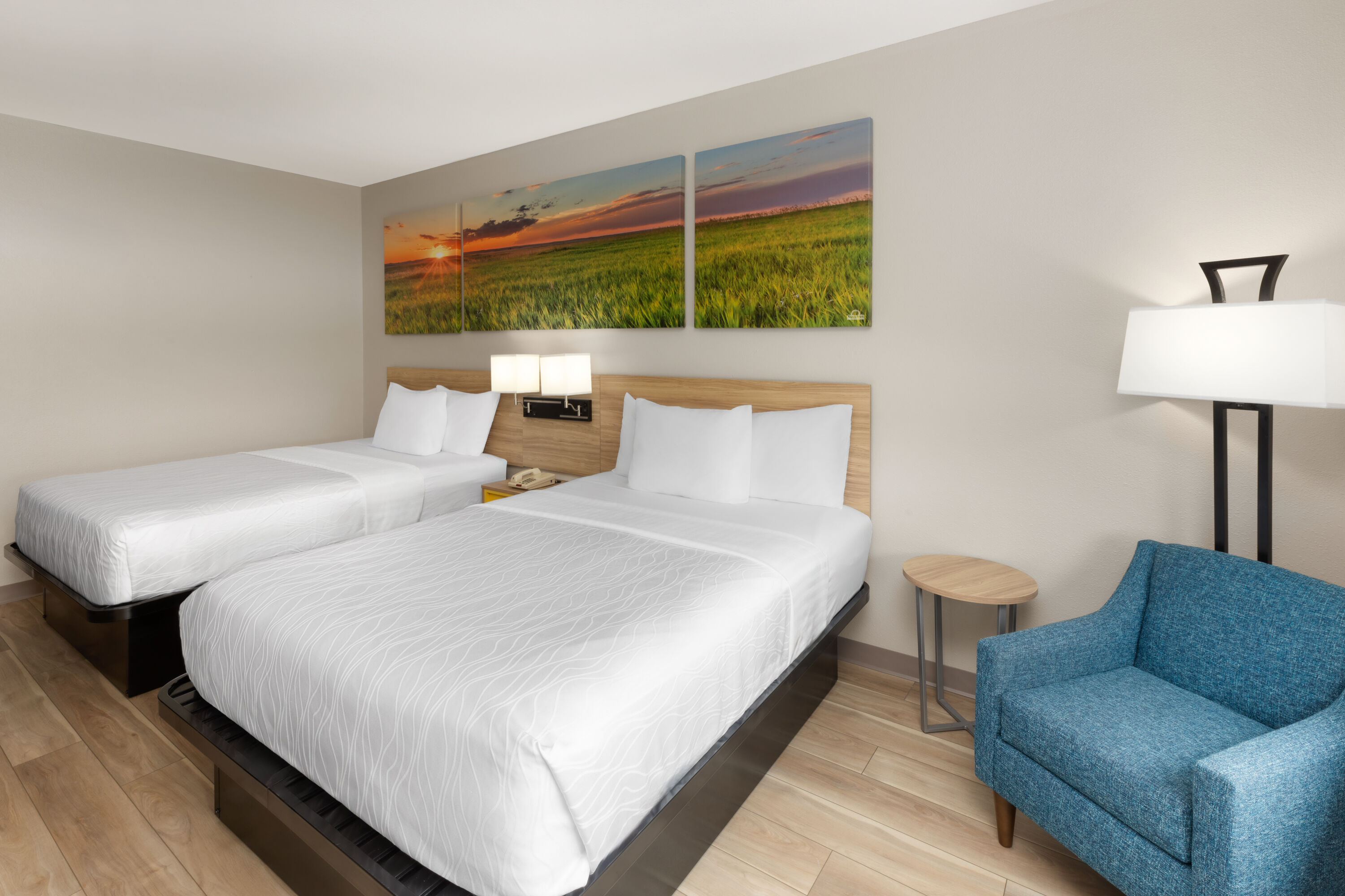 Guest room at the Days Inn & Suites by Wyndham Sam Houston Tollway in Houston, Texas