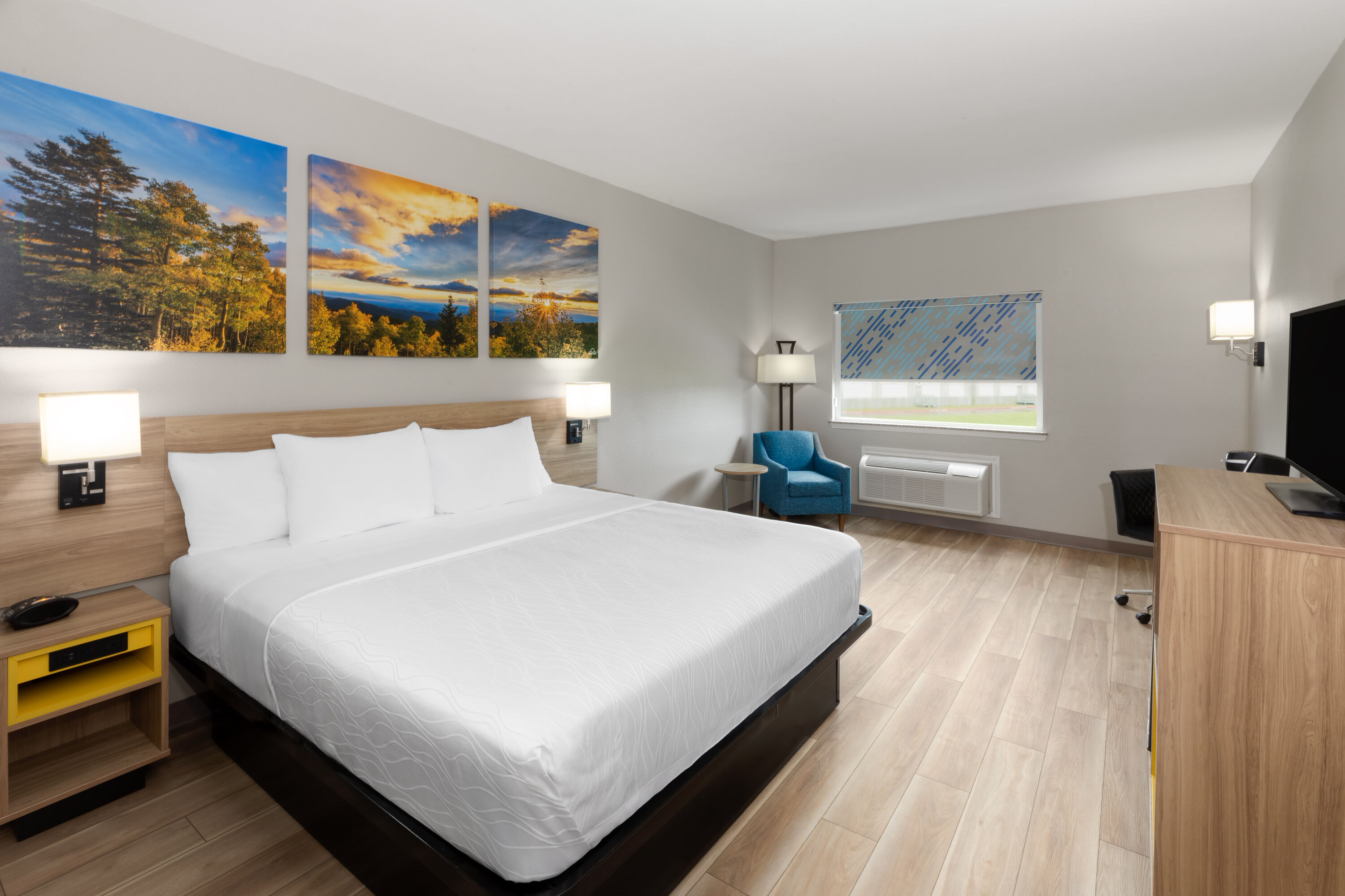 Guest room at the Days Inn & Suites by Wyndham Sam Houston Tollway in Houston, Texas