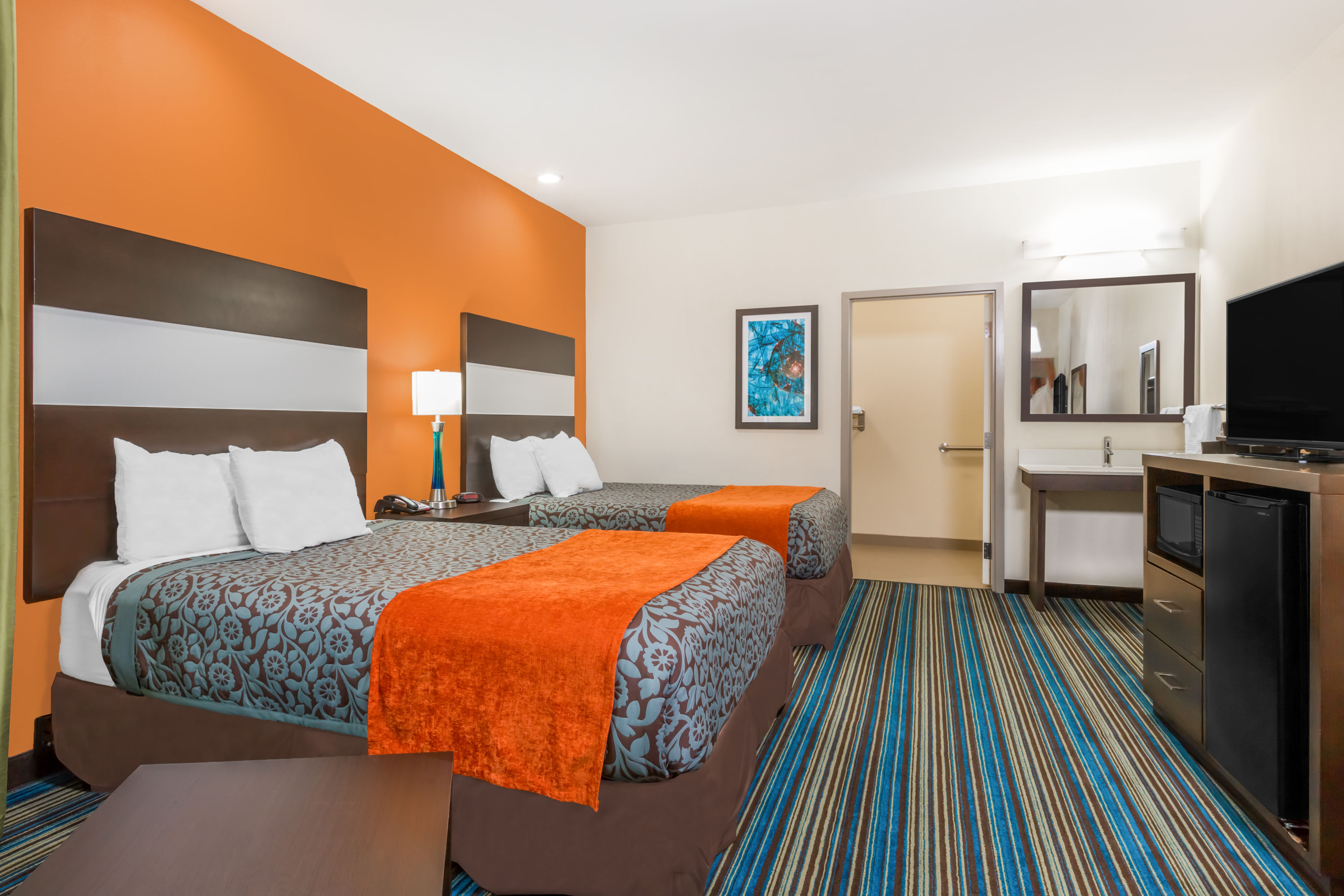 Guest room at the Days Inn & Suites by Wyndham Katy in Katy, Texas