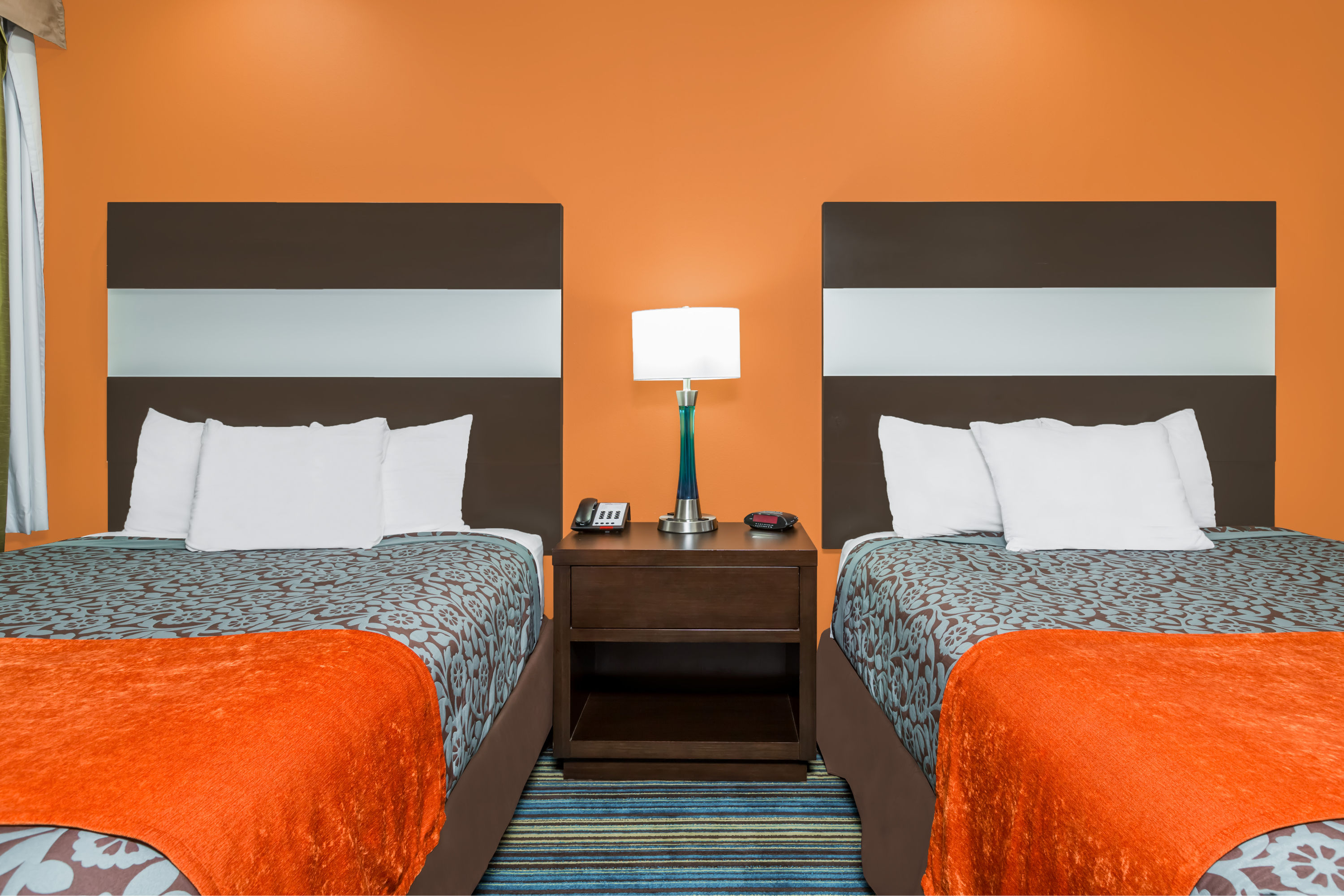 Guest room at the Days Inn & Suites by Wyndham Katy in Katy, Texas