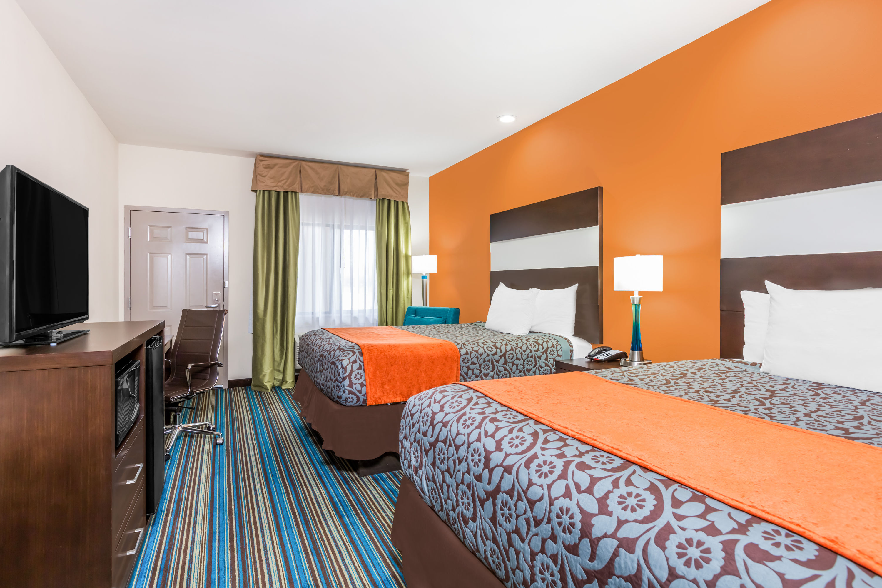 Guest room at the Days Inn & Suites by Wyndham Katy in Katy, Texas
