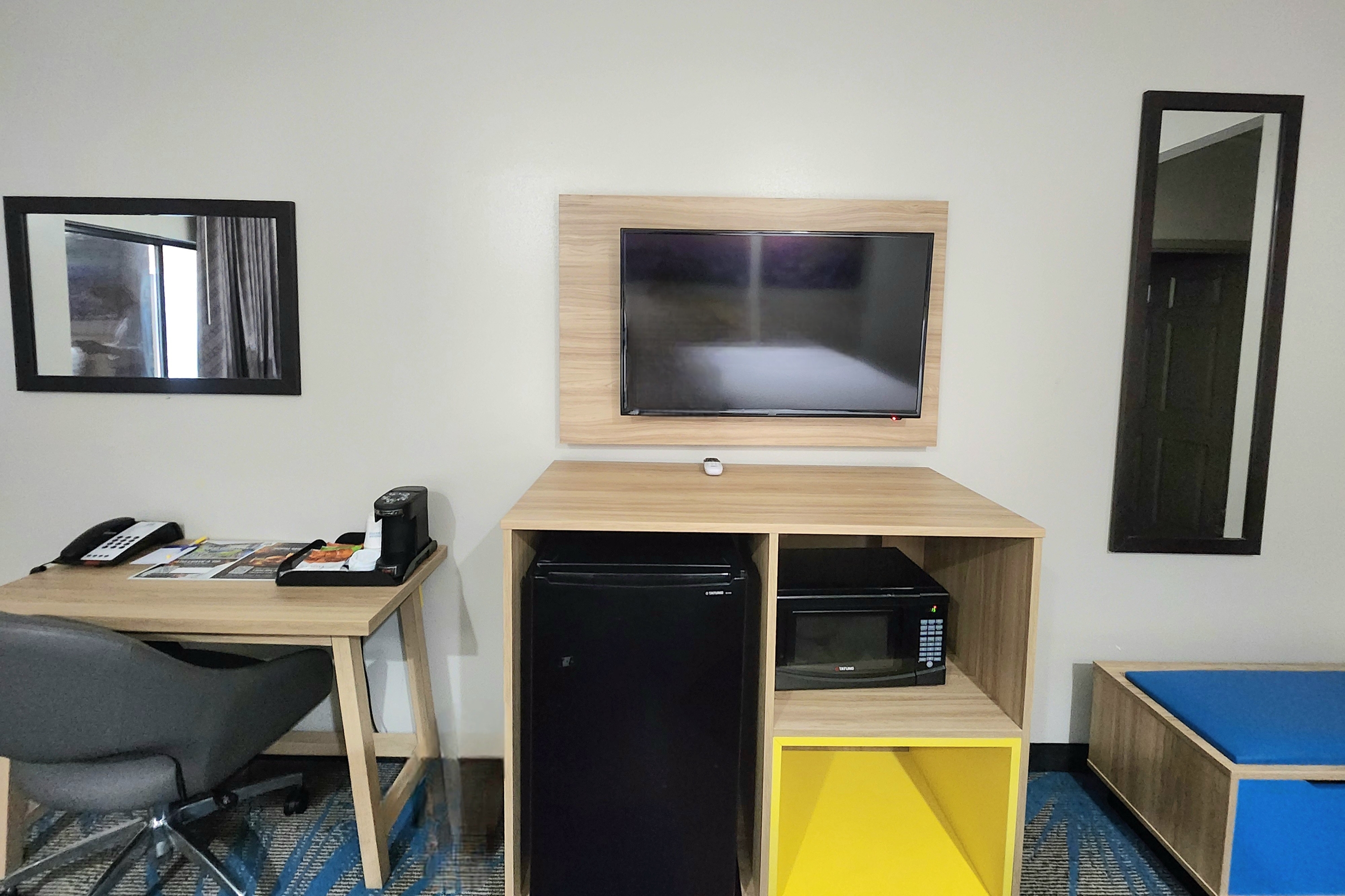 Guest room feature at the Days Inn & Suites by Wyndham Katy in Katy, Texas