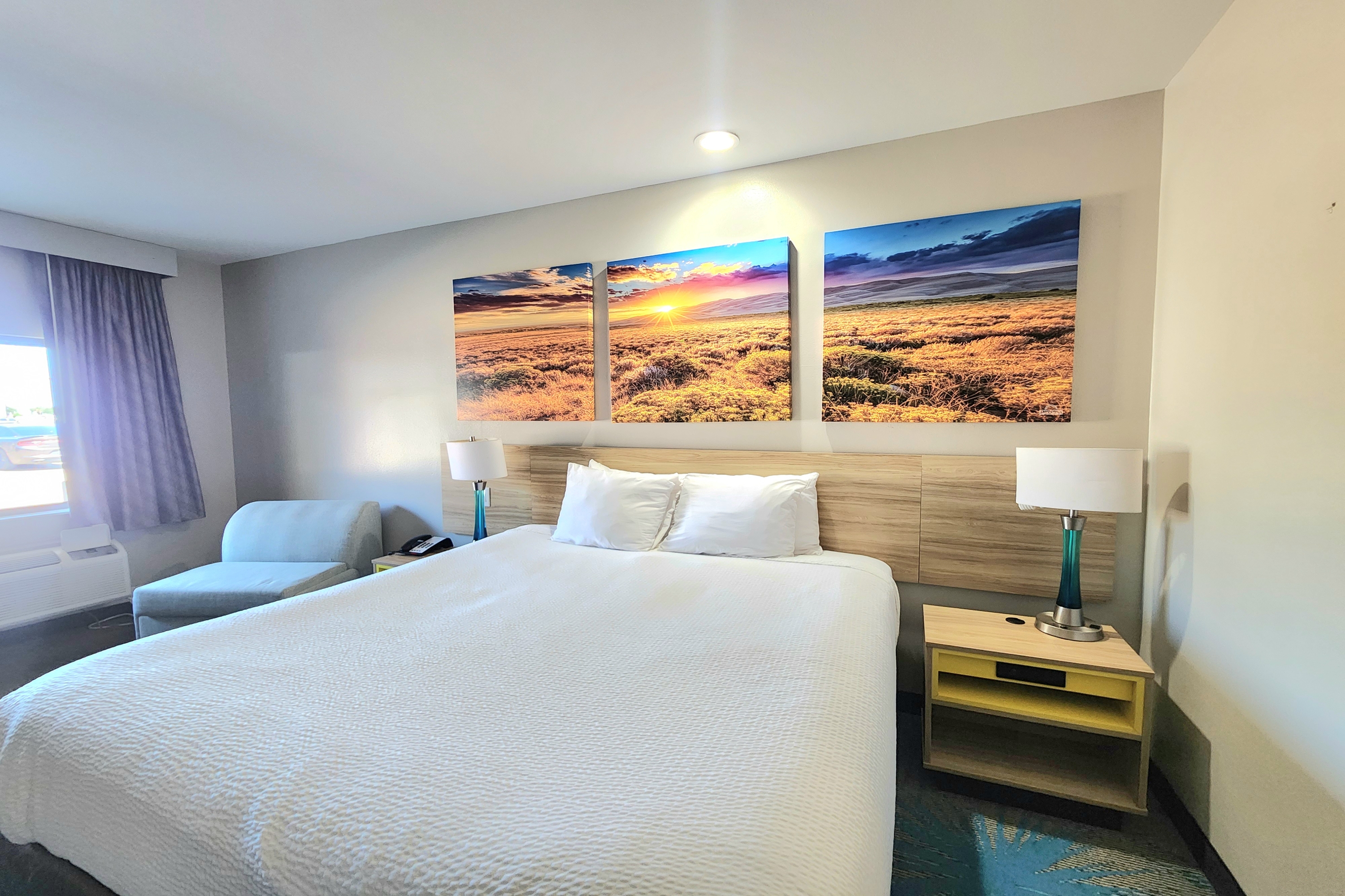 Guest room at the Days Inn & Suites by Wyndham Katy in Katy, Texas