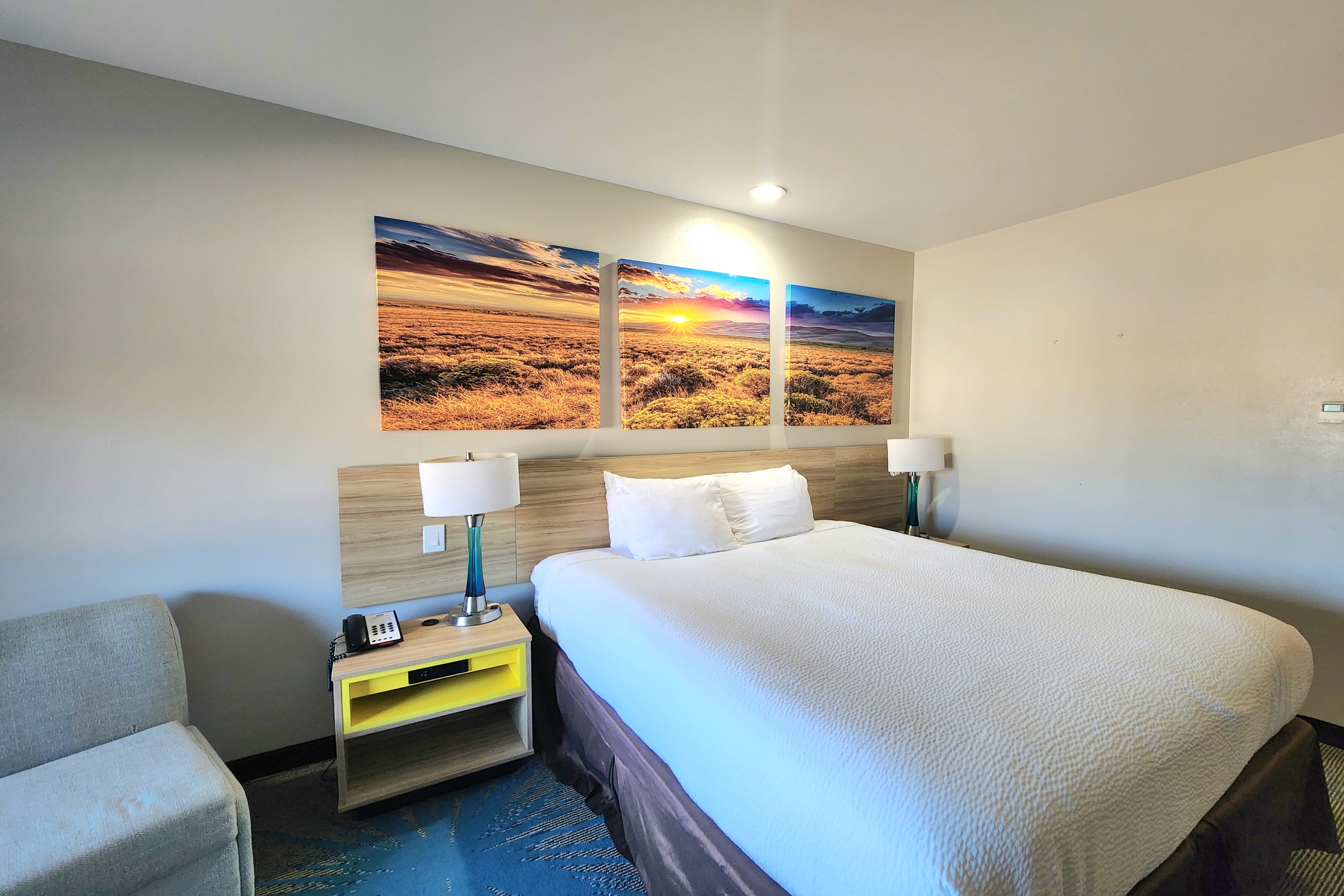 Guest room at the Days Inn & Suites by Wyndham Katy in Katy, Texas