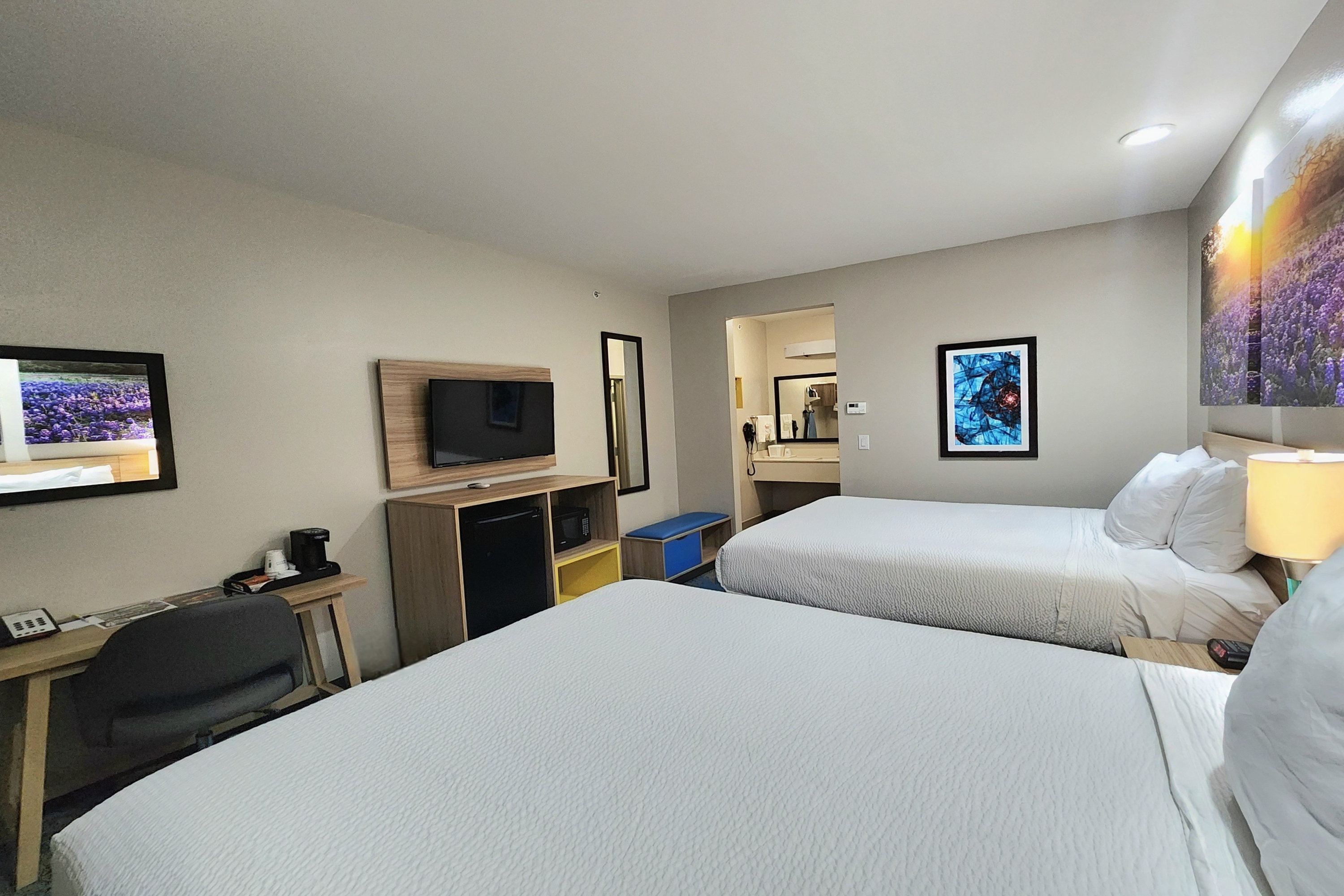 Guest room at the Days Inn & Suites by Wyndham Katy in Katy, Texas