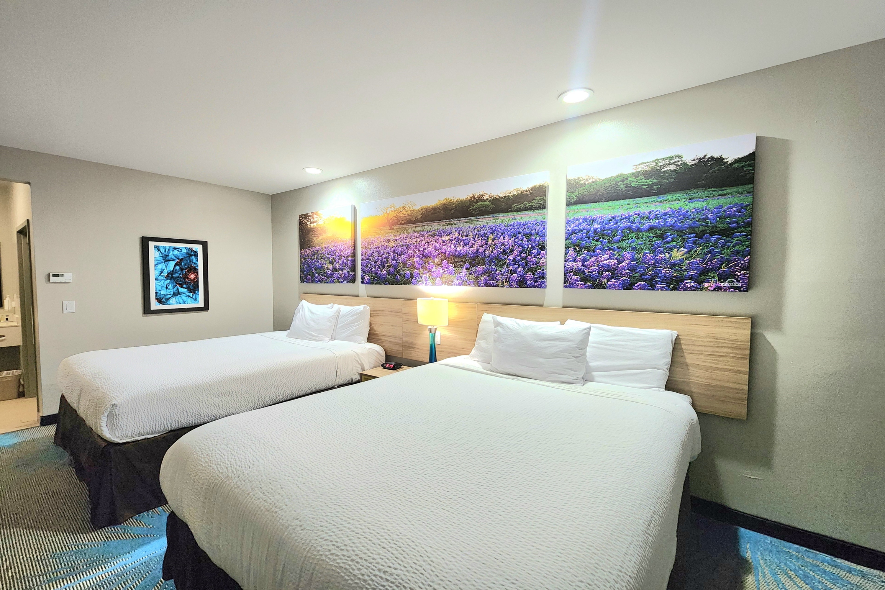Guest room at the Days Inn & Suites by Wyndham Katy in Katy, Texas